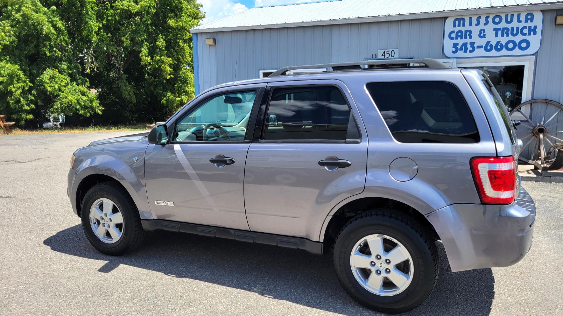 2008 Grey /Tan Ford Escape (1FMCU93138K) with an 3.0L V6 engine, 4 Speed Automatic transmission, located at 450 N Russell, Missoula, MT, 59801, (406) 543-6600, 46.874496, -114.017433 - Photo#0