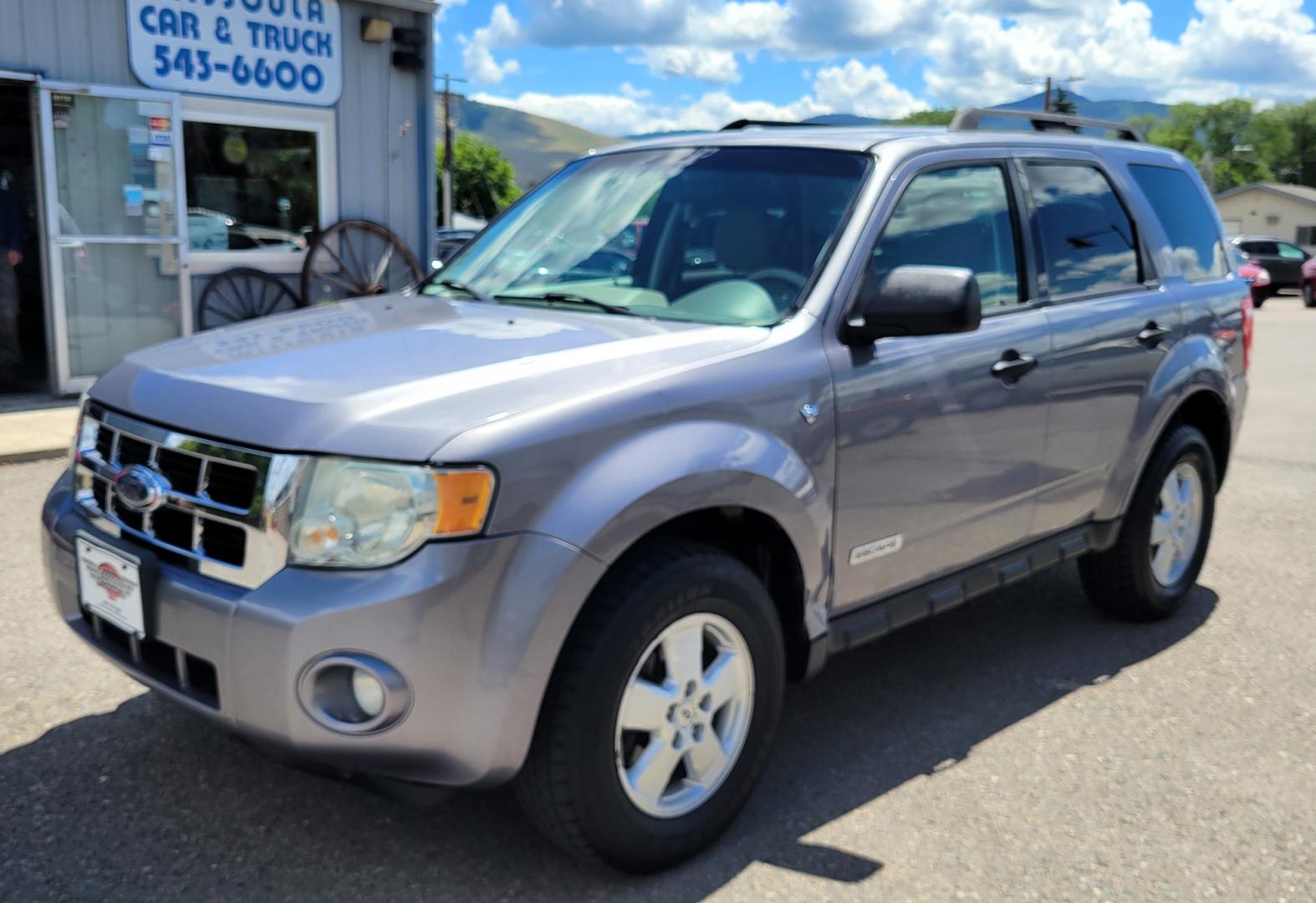 2008 Grey /Tan Ford Escape (1FMCU93138K) with an 3.0L V6 engine, 4 Speed Automatic transmission, located at 450 N Russell, Missoula, MT, 59801, (406) 543-6600, 46.874496, -114.017433 - Runs Great. 3.0L V6 Engine. All Wheel Drive. 4 Speed Automatic Transmission. Good Tires. Power Windows and Locks. Air. Cruise. Tilt. Power Drivers Seat. AM FM CD. - Photo#1