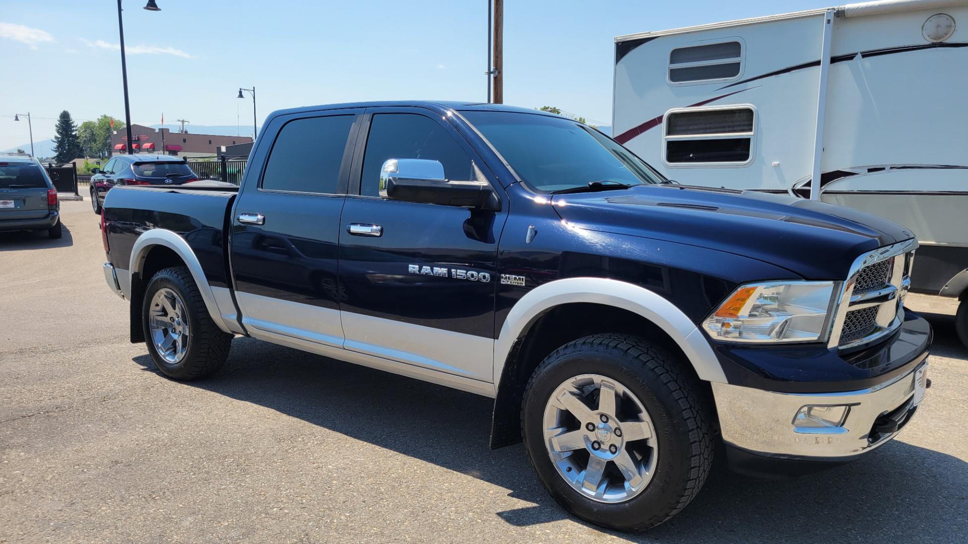 2012 Blue /Black Dodge Ram 1500 Laramie (1C6RD7NT8CS) with an 5.7 V8 Hem i engine, 6 Speed Auto transmission, located at 450 N Russell, Missoula, MT, 59801, (406) 543-6600, 46.874496, -114.017433 - Nice 4WD Hemi. 6 Speed Automatic Transmission. Power leather Seats. Heated and Cooled Front Seats. Heated Rear Seats. Heated Steering Wheel. Navigation. AM FM XM. Dual Climate Control Front. Power Windows and Locks. 26 Gallon Tank. 2 Key Fobs with Remote Start. - Photo#4