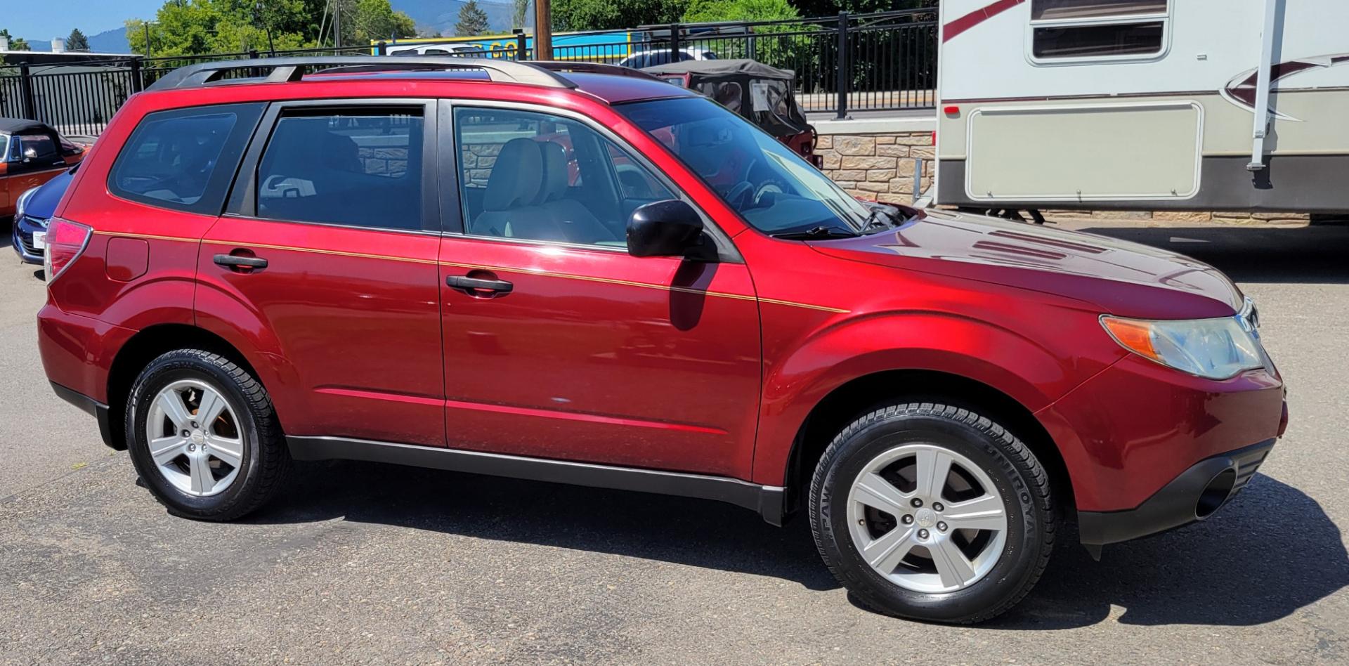 2012 Red /White Subaru Forester 2.5X (JF2SHABC3CH) with an 2.5L H4 engine, 4 Speed Auto transmission, located at 450 N Russell, Missoula, MT, 59801, (406) 543-6600, 46.874496, -114.017433 - Photo#4