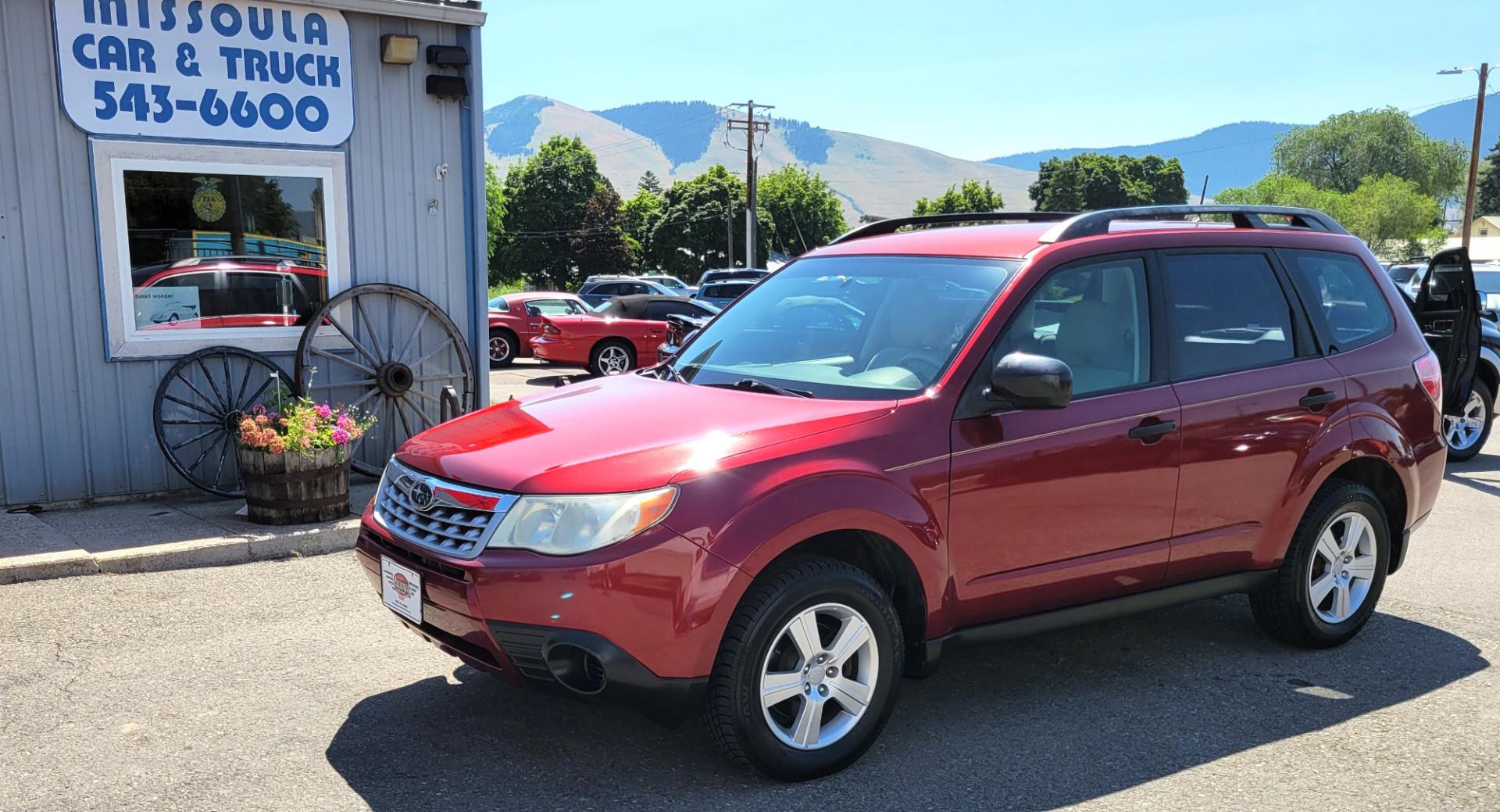 2012 Red /White Subaru Forester 2.5X (JF2SHABC3CH) with an 2.5L H4 engine, 4 Speed Auto transmission, located at 450 N Russell, Missoula, MT, 59801, (406) 543-6600, 46.874496, -114.017433 - Photo#1