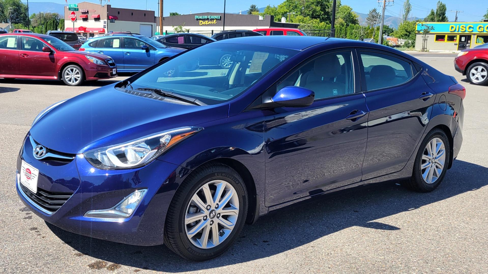 2014 Blue /Tan Hyundai Elantra SE (5NPDH4AE8EH) with an 1.8L L4 engine, 6 Speed Auto transmission, located at 450 N Russell, Missoula, MT, 59801, (406) 543-6600, 46.874496, -114.017433 - Nice little Sedan. Only 48358 Miles. 1.8L L4 Engine. 6 Speed Automatic Transmission. Great Fuel Economy. Heated Seats. Bluetooth. Backup Camera. AM FM CD. Power Windows and Locks. Air. Cruise. Tilt. There is a scuff by the left rear tire. - Photo#1