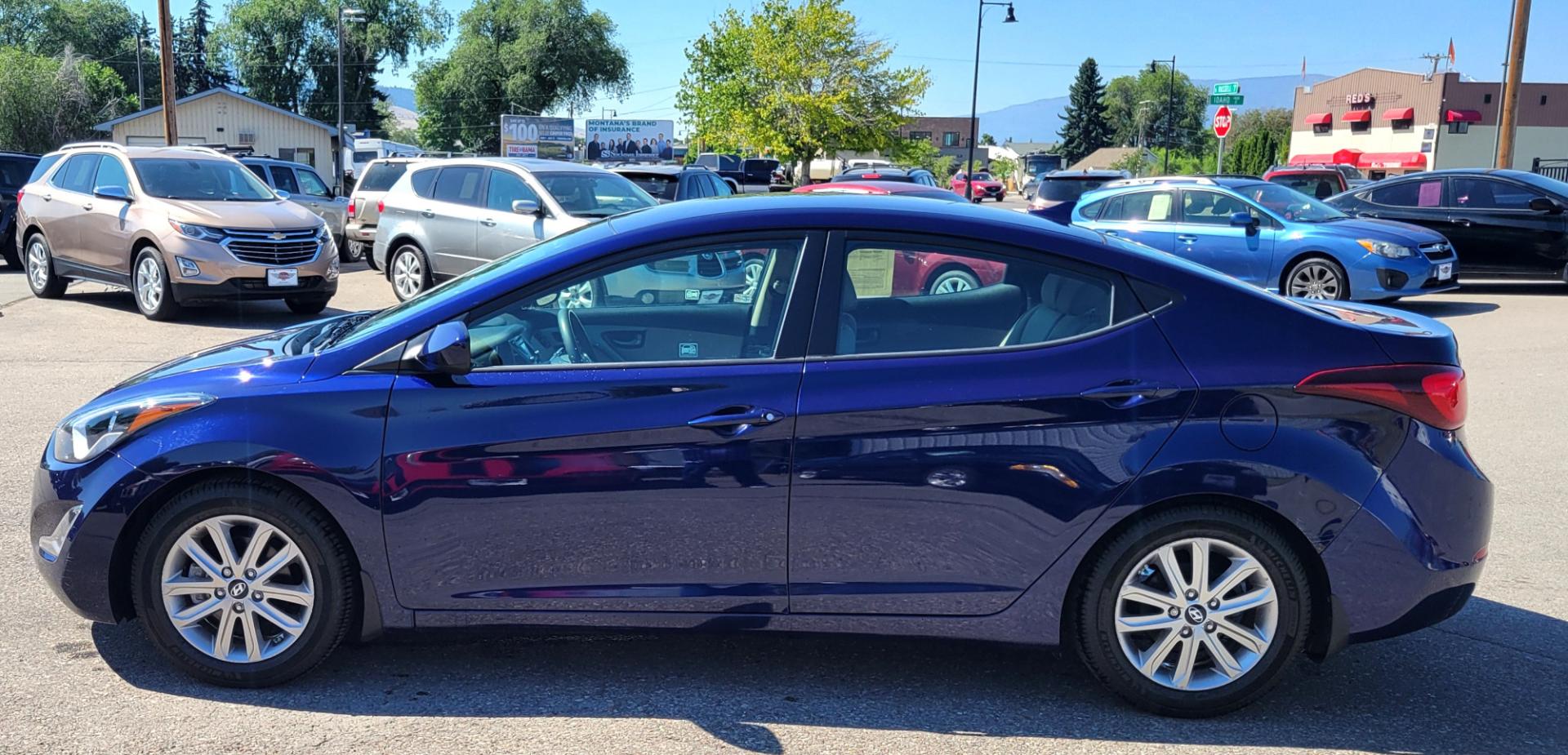 2014 Blue /Tan Hyundai Elantra SE (5NPDH4AE8EH) with an 1.8L L4 engine, 6 Speed Auto transmission, located at 450 N Russell, Missoula, MT, 59801, (406) 543-6600, 46.874496, -114.017433 - Nice little Sedan. Only 48358 Miles. 1.8L L4 Engine. 6 Speed Automatic Transmission. Great Fuel Economy. Heated Seats. Bluetooth. Backup Camera. AM FM CD. Power Windows and Locks. Air. Cruise. Tilt. There is a scuff by the left rear tire. - Photo#0