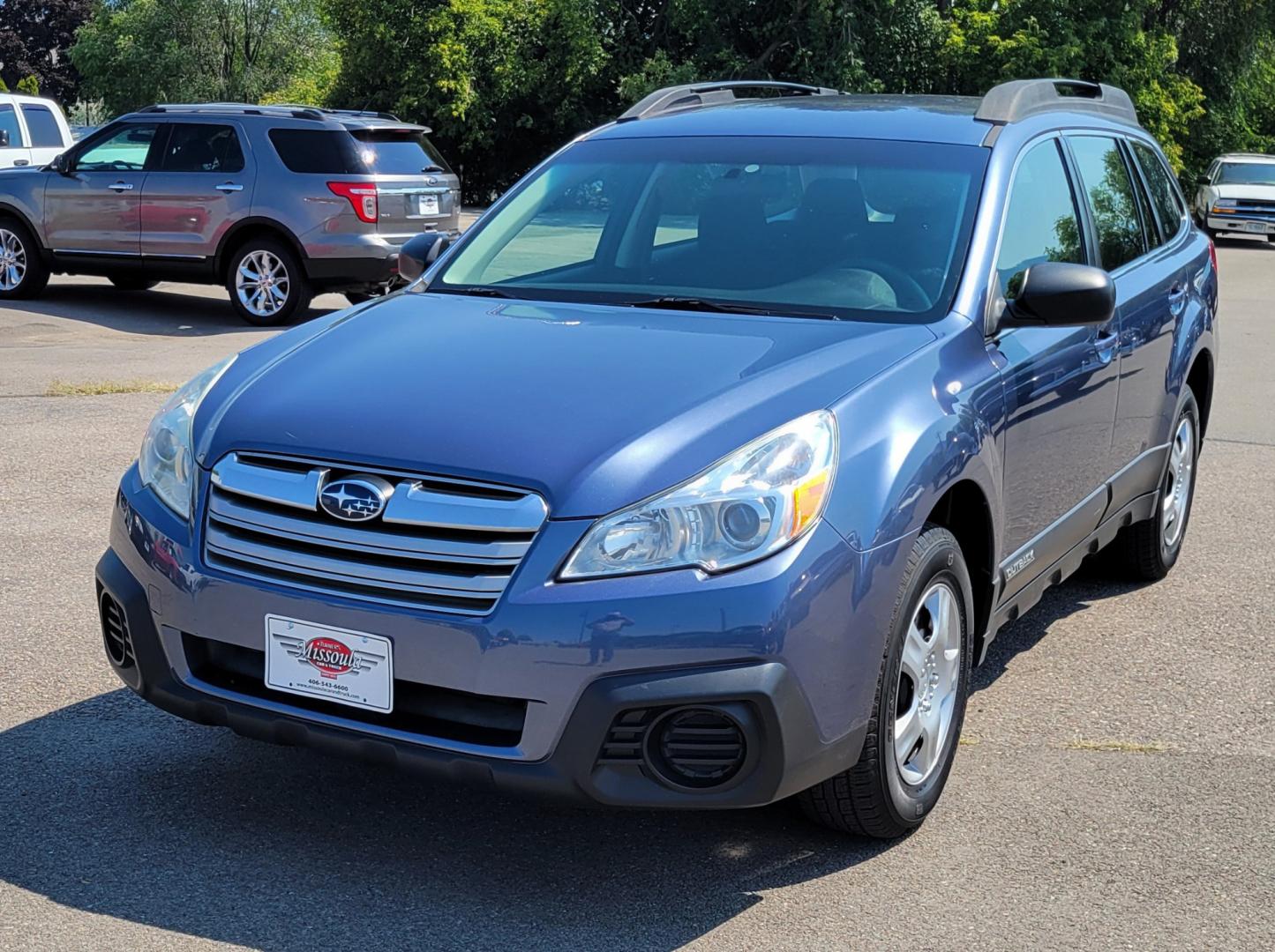 2013 Blue /Black Subaru Outback 2.5I (4S4BRBAC7D3) with an 2.5L H4 engine, Automatic transmission, located at 450 N Russell, Missoula, MT, 59801, (406) 543-6600, 46.874496, -114.017433 - One Owner. All Wheel Drive. 2.5L H4 Engine. Automatic Transmission. AM FM CD. Air. Cruise. Tilt. Power Windows and Locks. Bluetooth. Small dent in passenger front door. - Photo#1