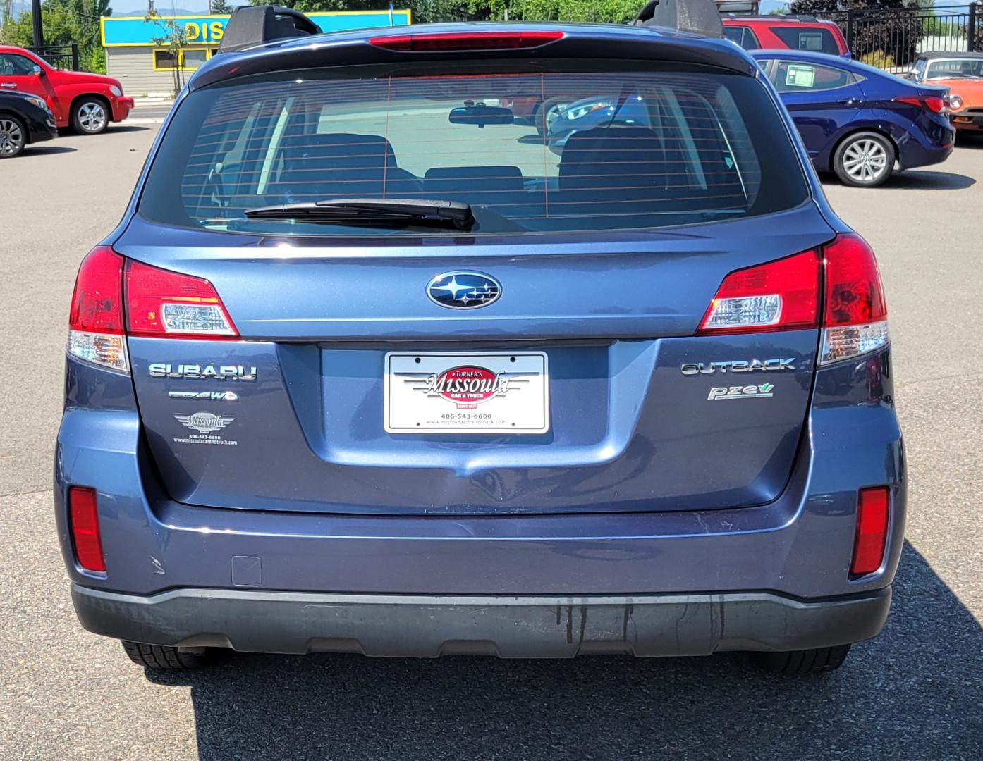 2013 Blue /Black Subaru Outback 2.5I (4S4BRBAC7D3) with an 2.5L H4 engine, Automatic transmission, located at 450 N Russell, Missoula, MT, 59801, (406) 543-6600, 46.874496, -114.017433 - One Owner. All Wheel Drive. 2.5L H4 Engine. Automatic Transmission. AM FM CD. Air. Cruise. Tilt. Power Windows and Locks. Bluetooth. Small dent in passenger front door. - Photo#3