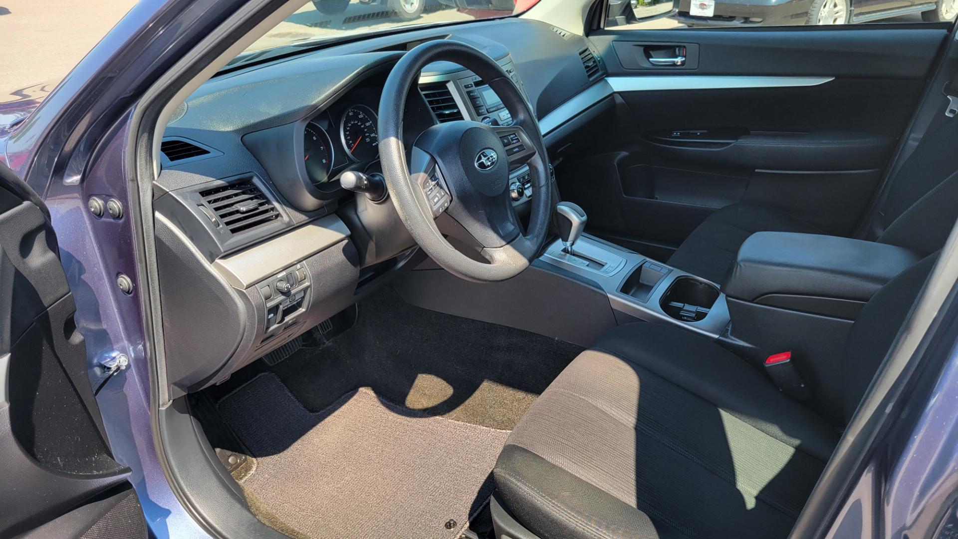 2013 Blue /Black Subaru Outback 2.5I (4S4BRBAC7D3) with an 2.5L H4 engine, Automatic transmission, located at 450 N Russell, Missoula, MT, 59801, (406) 543-6600, 46.874496, -114.017433 - One Owner. All Wheel Drive. 2.5L H4 Engine. Automatic Transmission. AM FM CD. Air. Cruise. Tilt. Power Windows and Locks. Bluetooth. Small dent in passenger front door. - Photo#9