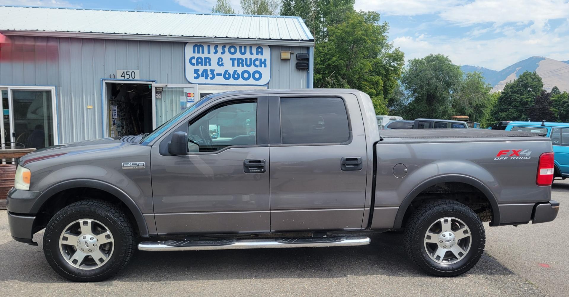 2008 Grey /Black Ford F-150 FX4 SuperCrew (1FTPW14V18F) with an 5.4L V8 SOHC 24V FFV engine, 4-Speed Automatic Overdrive transmission, located at 450 N Russell, Missoula, MT, 59801, (406) 543-6600, 46.874496, -114.017433 - Good Running 4 Wheel Drive. 5.4L V8. 4 Speed Automatic Transmission. Towing. Air. Cruise.Tilt. Power Windows and Locks. Running Boards. Front bumper has a dent. - Photo#1