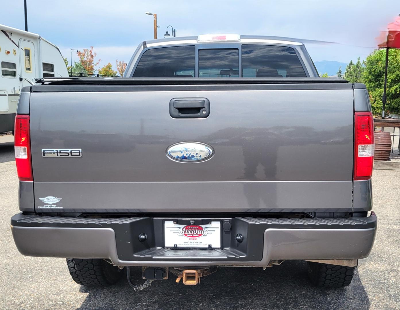 2008 Grey /Black Ford F-150 FX4 SuperCrew (1FTPW14V18F) with an 5.4L V8 SOHC 24V FFV engine, 4-Speed Automatic Overdrive transmission, located at 450 N Russell, Missoula, MT, 59801, (406) 543-6600, 46.874496, -114.017433 - Good Running 4 Wheel Drive. 5.4L V8. 4 Speed Automatic Transmission. Towing. Air. Cruise.Tilt. Power Windows and Locks. Running Boards. Front bumper has a dent. - Photo#7