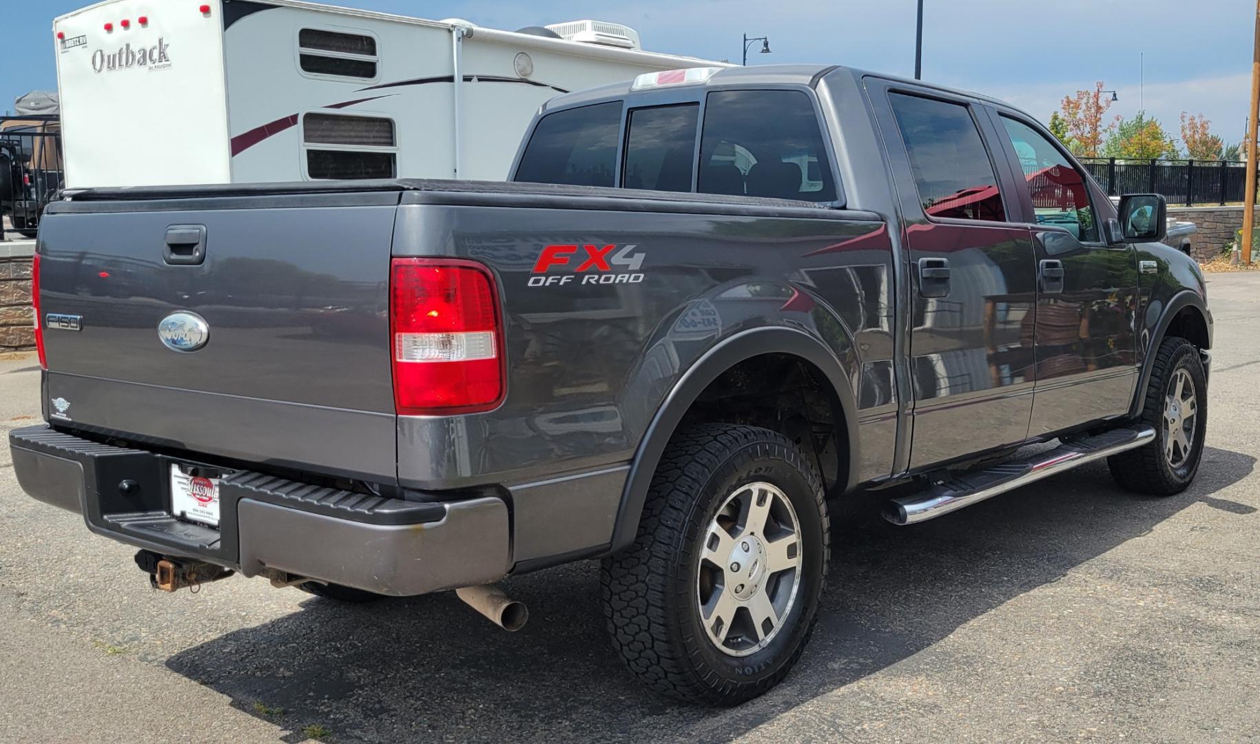 2008 Grey /Black Ford F-150 FX4 SuperCrew (1FTPW14V18F) with an 5.4L V8 SOHC 24V FFV engine, 4-Speed Automatic Overdrive transmission, located at 450 N Russell, Missoula, MT, 59801, (406) 543-6600, 46.874496, -114.017433 - Good Running 4 Wheel Drive. 5.4L V8. 4 Speed Automatic Transmission. Towing. Air. Cruise.Tilt. Power Windows and Locks. Running Boards. Front bumper has a dent. - Photo#6