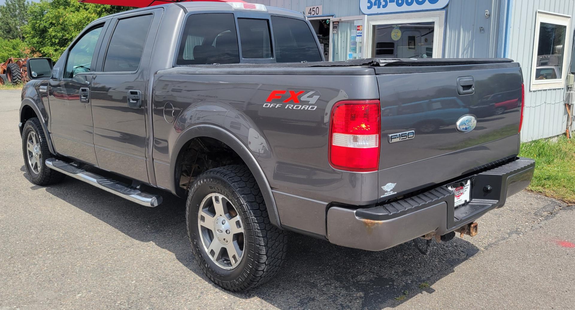 2008 Grey /Black Ford F-150 FX4 SuperCrew (1FTPW14V18F) with an 5.4L V8 SOHC 24V FFV engine, 4-Speed Automatic Overdrive transmission, located at 450 N Russell, Missoula, MT, 59801, (406) 543-6600, 46.874496, -114.017433 - Good Running 4 Wheel Drive. 5.4L V8. 4 Speed Automatic Transmission. Towing. Air. Cruise.Tilt. Power Windows and Locks. Running Boards. Front bumper has a dent. - Photo#8