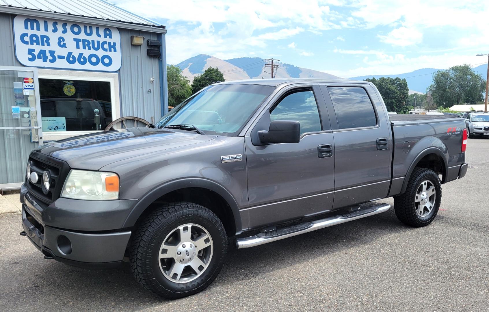 2008 Grey /Black Ford F-150 FX4 SuperCrew (1FTPW14V18F) with an 5.4L V8 SOHC 24V FFV engine, 4-Speed Automatic Overdrive transmission, located at 450 N Russell, Missoula, MT, 59801, (406) 543-6600, 46.874496, -114.017433 - Good Running 4 Wheel Drive. 5.4L V8. 4 Speed Automatic Transmission. Towing. Air. Cruise.Tilt. Power Windows and Locks. Running Boards. Front bumper has a dent. - Photo#0