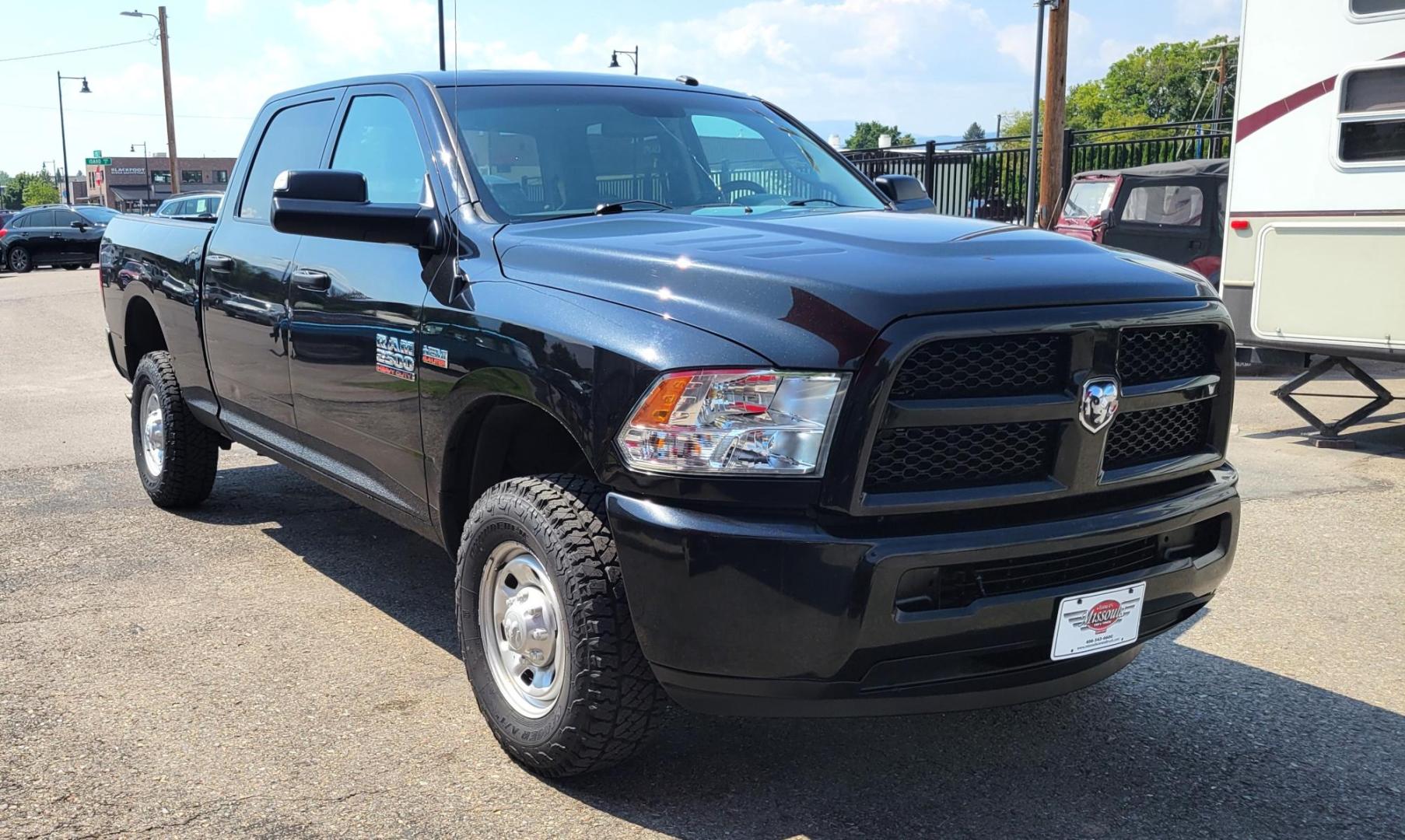 2015 Black /Black RAM 2500 Tradesman Crew Cab SWB 4WD (3C6UR5CJ3FG) with an 6.7L L6 engine, 6-Speed Automatic transmission, located at 450 N Russell, Missoula, MT, 59801, (406) 543-6600, 46.874496, -114.017433 - Nice Heavy Duty 3/4 Ton 4WD. 6.4L Hemi Engine. 6 Speed Auto Transmission. Air. Cruise. Tilt. Power Windows and Locks. AM FM XM Bluetooth. Like NEW Tires. - Photo#3