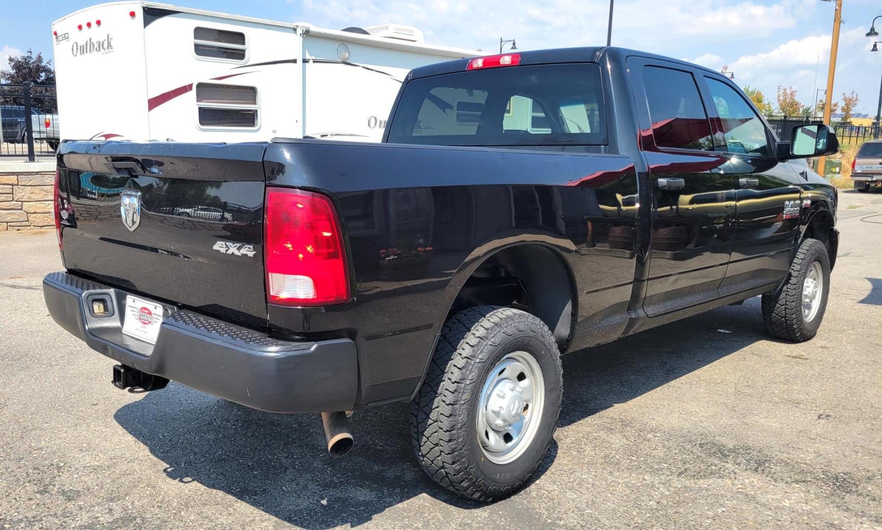 2015 Black /Black RAM 2500 Tradesman Crew Cab SWB 4WD (3C6UR5CJ3FG) with an 6.7L L6 engine, 6-Speed Automatic transmission, located at 450 N Russell, Missoula, MT, 59801, (406) 543-6600, 46.874496, -114.017433 - Nice Heavy Duty 3/4 Ton 4WD. 6.4L Hemi Engine. 6 Speed Auto Transmission. Air. Cruise. Tilt. Power Windows and Locks. AM FM XM Bluetooth. Like NEW Tires. - Photo#4