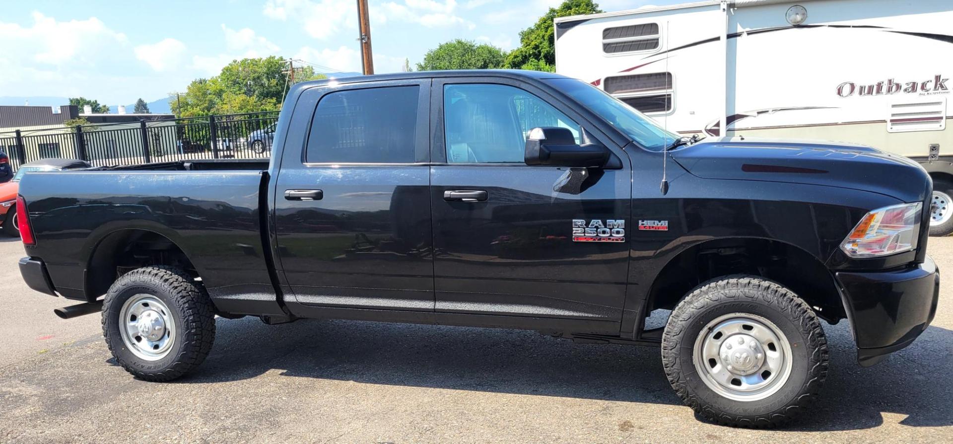 2015 Black /Black RAM 2500 Tradesman Crew Cab SWB 4WD (3C6UR5CJ3FG) with an 6.7L L6 engine, 6-Speed Automatic transmission, located at 450 N Russell, Missoula, MT, 59801, (406) 543-6600, 46.874496, -114.017433 - Nice Heavy Duty 3/4 Ton 4WD. 6.4L Hemi Engine. 6 Speed Auto Transmission. Air. Cruise. Tilt. Power Windows and Locks. AM FM XM Bluetooth. Like NEW Tires. - Photo#5