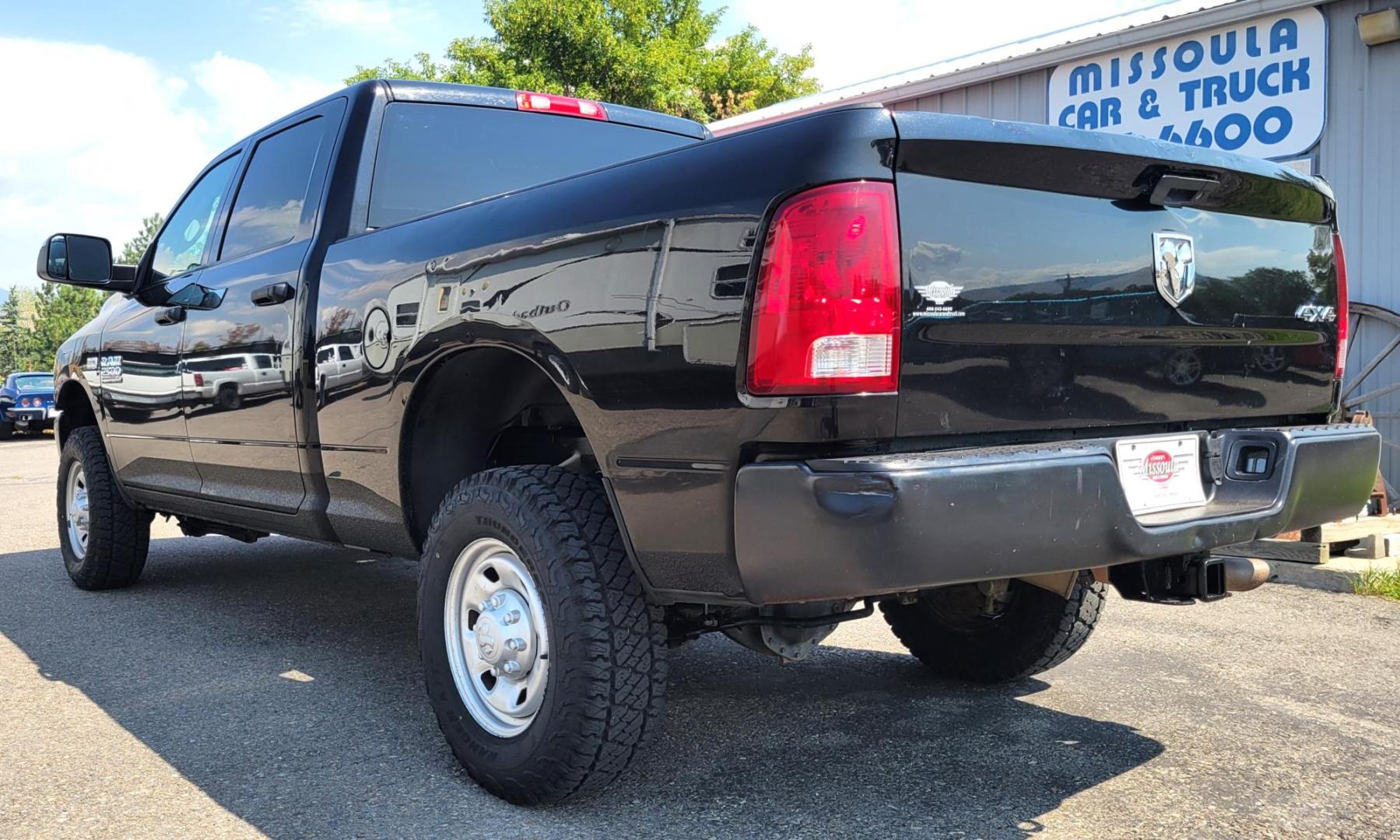 2015 Black /Black RAM 2500 Tradesman Crew Cab SWB 4WD (3C6UR5CJ3FG) with an 6.7L L6 engine, 6-Speed Automatic transmission, located at 450 N Russell, Missoula, MT, 59801, (406) 543-6600, 46.874496, -114.017433 - Nice Heavy Duty 3/4 Ton 4WD. 6.4L Hemi Engine. 6 Speed Auto Transmission. Air. Cruise. Tilt. Power Windows and Locks. AM FM XM Bluetooth. Like NEW Tires. - Photo#8