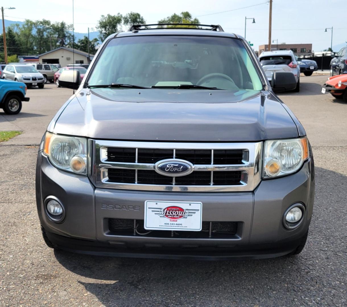 2009 Grey /White Ford Escape XLT 4WD I4 (1FMCU93709K) with an 2.5L L4 DOHC 16V engine, 4-Speed Automatic transmission, located at 450 N Russell, Missoula, MT, 59801, (406) 543-6600, 46.874496, -114.017433 - Photo#2