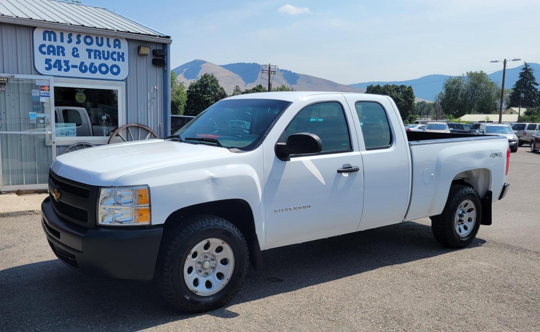 2013 White /Black Chevrolet Silverado 1500 Work Truck Ext. Cab 4WD (1GCRKPEAXDZ) with an 4.8L V8 OHV 16V engine, Automatic transmission, located at 450 N Russell, Missoula, MT, 59801, (406) 543-6600, 46.874496, -114.017433 - Solid Work Truck. 4WD. 4.8L V8. Automatic Transmission. Good Tires. Air. Cruise. Tilt. Power Windows. AM FM. - Photo#4