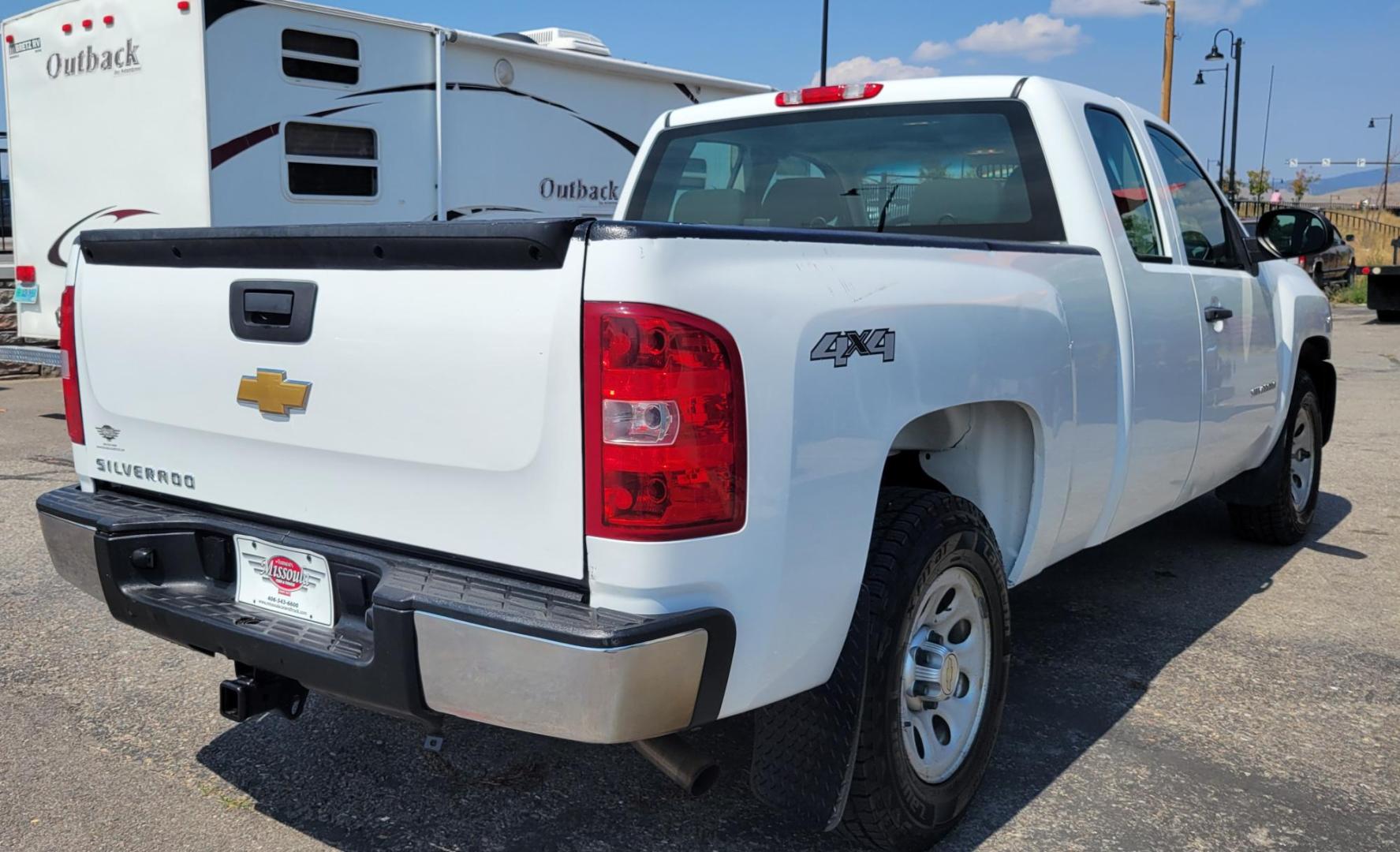 2013 White /Black Chevrolet Silverado 1500 Work Truck Ext. Cab 4WD (1GCRKPEAXDZ) with an 4.8L V8 OHV 16V engine, Automatic transmission, located at 450 N Russell, Missoula, MT, 59801, (406) 543-6600, 46.874496, -114.017433 - Solid Work Truck. 4WD. 4.8L V8. Automatic Transmission. Good Tires. Air. Cruise. Tilt. Power Windows. AM FM. - Photo#7