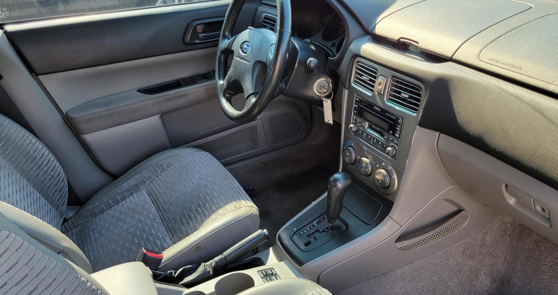 2003 Silver /Gray Subaru Forester 2.5 XS (JF1SG65633H) with an 2.5L H4 SOHC 16V engine, 4-Speed Automatic Overdrive transmission, located at 450 N Russell, Missoula, MT, 59801, (406) 543-6600, 46.874496, -114.017433 - Photo#12