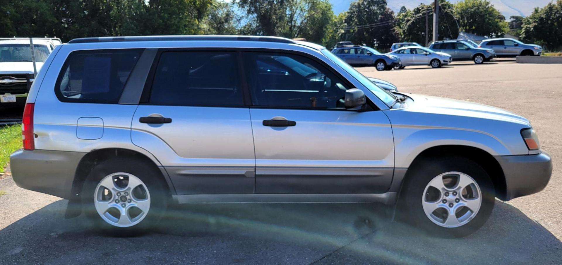 2003 Silver /Gray Subaru Forester 2.5 XS (JF1SG65633H) with an 2.5L H4 SOHC 16V engine, 4-Speed Automatic Overdrive transmission, located at 450 N Russell, Missoula, MT, 59801, (406) 543-6600, 46.874496, -114.017433 - Photo#3