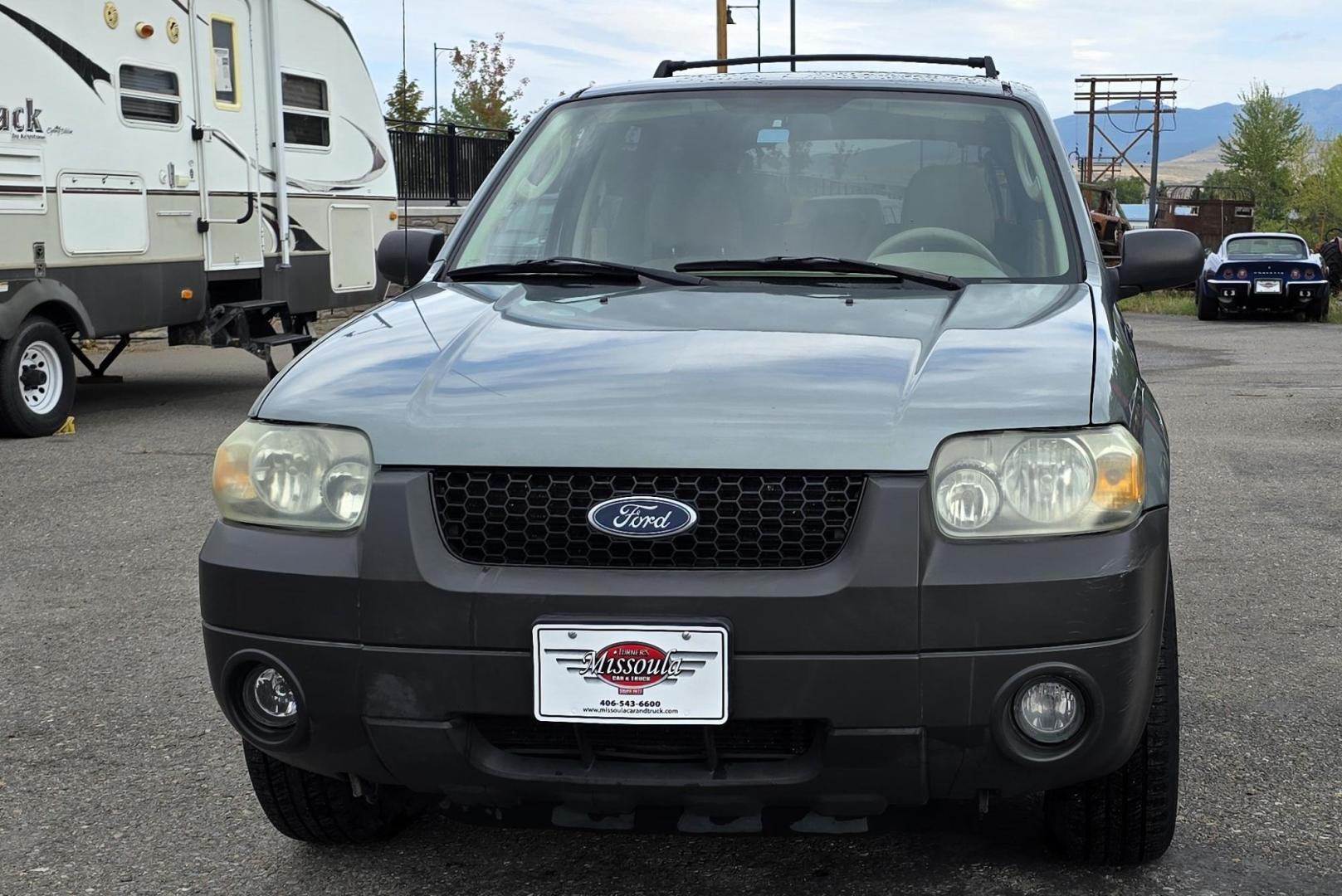 2005 Green /White Ford Escape XLT 4WD (1FMYU93105K) with an 3.0L V6 DOHC 24V engine, 4-Speed Automatic Overdrive transmission, located at 450 N Russell, Missoula, MT, 59801, (406) 543-6600, 46.874496, -114.017433 - Zippy little SUV. 3.0 V6 Engine. Automatic Transmission. AWD. Air. Cruise. Tilt. Power Windows and Locks. Bluetooth Stereo. Great Miles for its age. very Clean. Nice tow hitch, - Photo#6