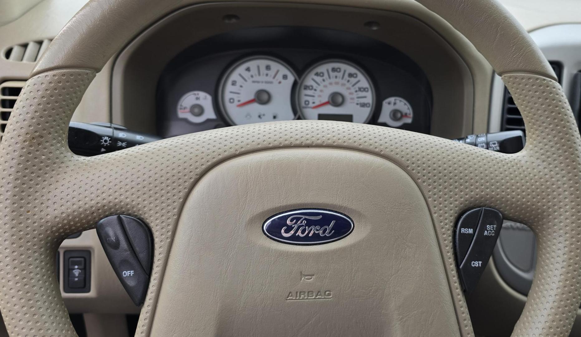 2005 Green /White Ford Escape XLT 4WD (1FMYU93105K) with an 3.0L V6 DOHC 24V engine, 4-Speed Automatic Overdrive transmission, located at 450 N Russell, Missoula, MT, 59801, (406) 543-6600, 46.874496, -114.017433 - Zippy little SUV. 3.0 V6 Engine. Automatic Transmission. AWD. Air. Cruise. Tilt. Power Windows and Locks. Bluetooth Stereo. Great Miles for its age. very Clean. Nice tow hitch, - Photo#8