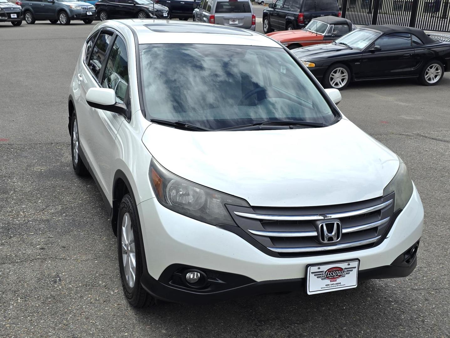 2014 White /Black Honda CR-V EX 4WD 5-Speed AT (5J6RM4H50EL) with an 2.4L L4 DOHC 16V engine, 5-Speed Automatic transmission, located at 450 N Russell, Missoula, MT, 59801, (406) 543-6600, 46.874496, -114.017433 - Sweet One Owner AWD CRV with a Clean Carfax. 2.4L I4 Engine. Automatic Transmission. Power Sunroof. Backup Camera. Bluetooth. Air Cruise. Tilt. Power Windows and Locks. - Photo#4