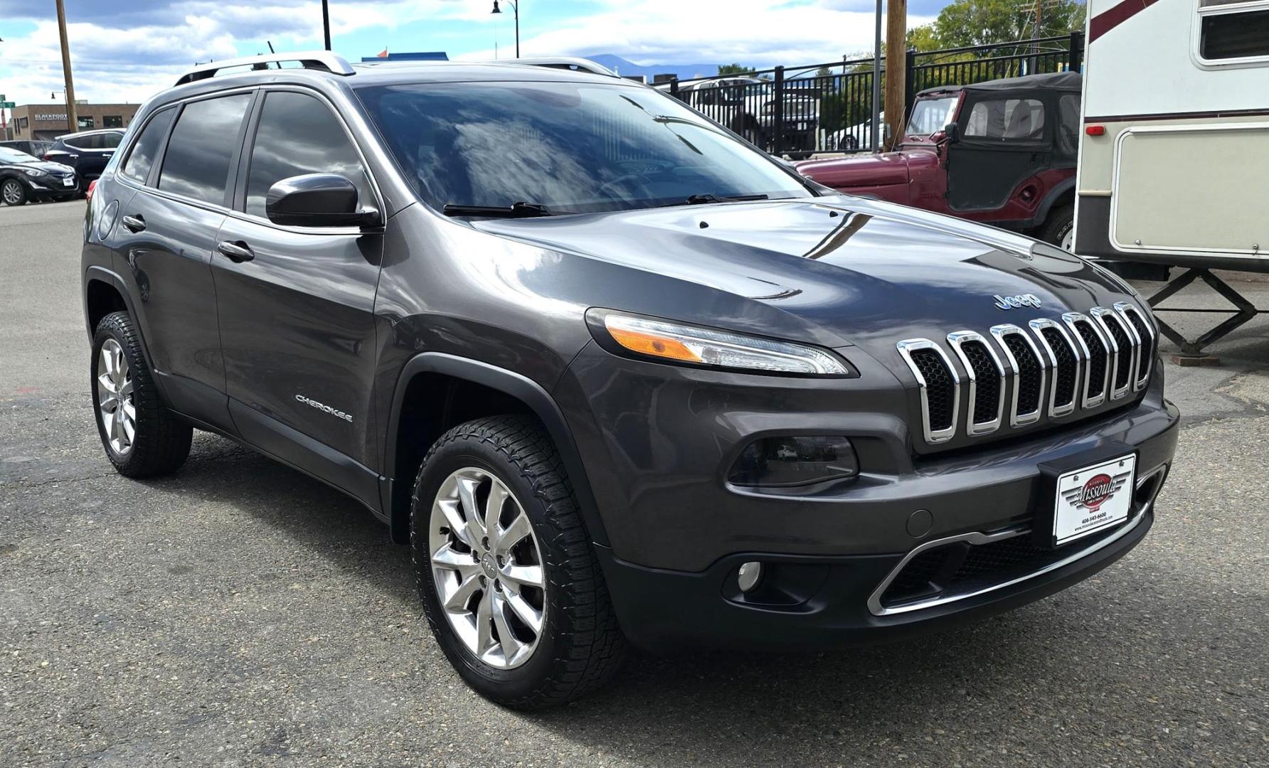 2014 Grey /Black Jeep Cherokee Limited 4WD (1C4PJMDS8EW) with an 3.2L V6 DOHC 24V engine, 9-Speed Automatic transmission, located at 450 N Russell, Missoula, MT, 59801, (406) 543-6600, 46.874496, -114.017433 - Clean 4WD Jeep Cherokee. Power Sunroof. heated and Cooled Leather Seats. Heated Steering Wheel. Bluetooth. Backup Camera. Navigation. Air. Cruise. Tilt. Power Windows and Locks. - Photo#3