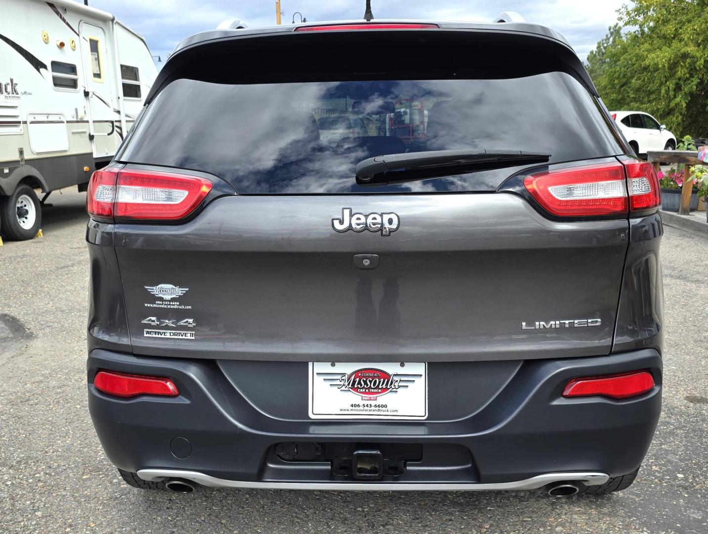 2014 Grey /Black Jeep Cherokee Limited 4WD (1C4PJMDS8EW) with an 3.2L V6 DOHC 24V engine, 9-Speed Automatic transmission, located at 450 N Russell, Missoula, MT, 59801, (406) 543-6600, 46.874496, -114.017433 - Clean 4WD Jeep Cherokee. Power Sunroof. heated and Cooled Leather Seats. Heated Steering Wheel. Bluetooth. Backup Camera. Navigation. Air. Cruise. Tilt. Power Windows and Locks. - Photo#5