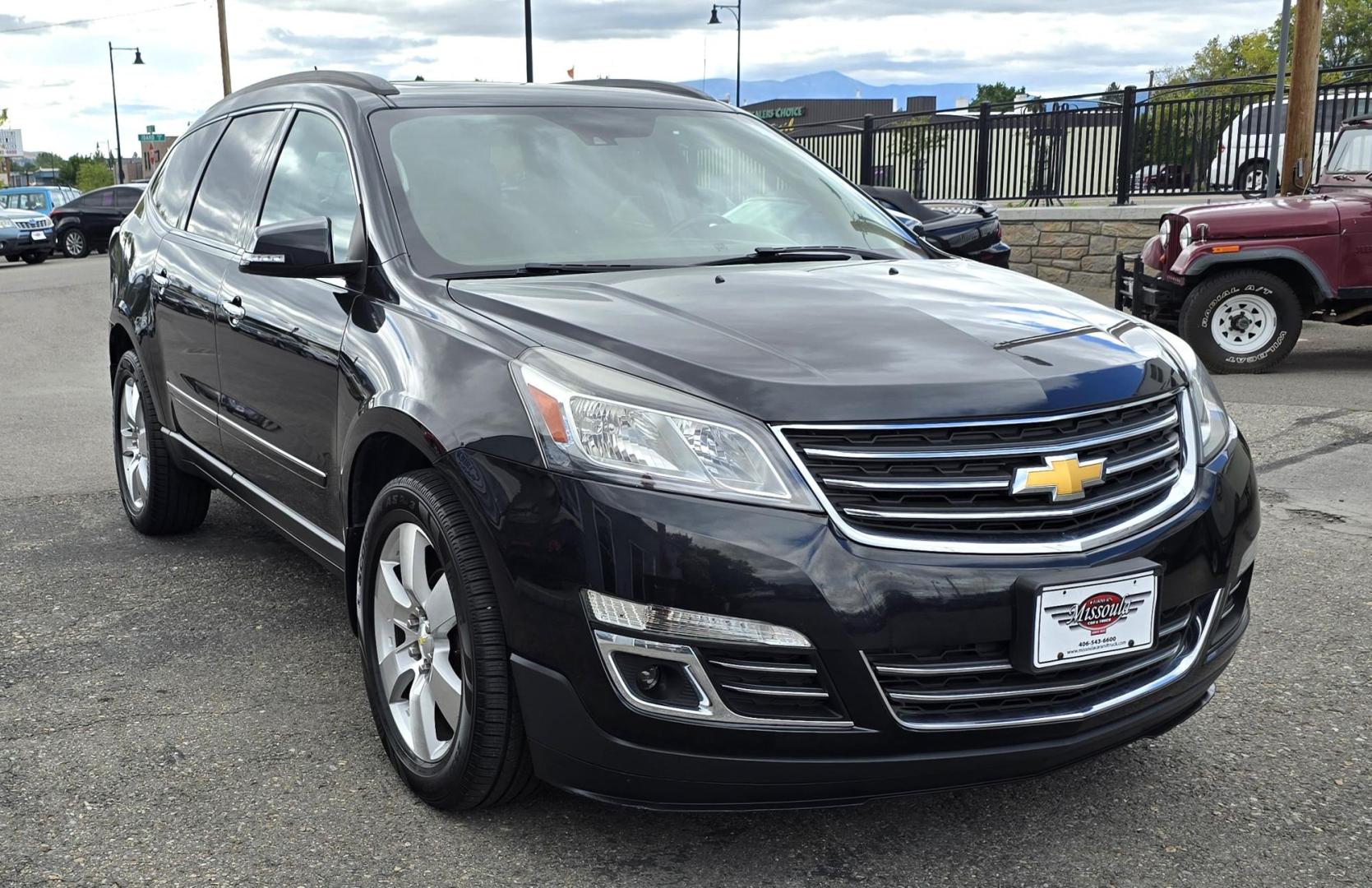 2014 Black /Black Chevrolet Traverse LTZ AWD (1GNKVJKD8EJ) with an 3.6L V6 DOHC 24V engine, 6-Speed Automatic transmission, located at 450 N Russell, Missoula, MT, 59801, (406) 543-6600, 46.874496, -114.017433 - Beautiful Loaded AWD Chevy. 3.6L V6 Engine. Automatic Transmission. Two Sun Roofs. Rear Entertainment. Heated and Cooled Front Seats. Middle Seats are Buckets with Arm Rests. 3rd Row Seating. Bluetooth Audio and Phone Connectivity. Excellent Tires. Front and Rear Climate Control. Bose Sound System. - Photo#3