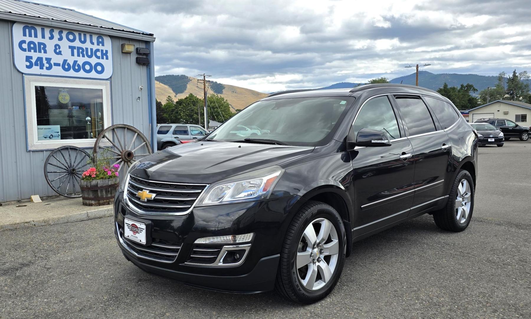 2014 Black /Black Chevrolet Traverse LTZ AWD (1GNKVJKD8EJ) with an 3.6L V6 DOHC 24V engine, 6-Speed Automatic transmission, located at 450 N Russell, Missoula, MT, 59801, (406) 543-6600, 46.874496, -114.017433 - Beautiful Loaded AWD Chevy. 3.6L V6 Engine. Automatic Transmission. Two Sun Roofs. Rear Entertainment. Heated and Cooled Front Seats. Middle Seats are Buckets with Arm Rests. 3rd Row Seating. Bluetooth Audio and Phone Connectivity. Excellent Tires. Front and Rear Climate Control. Bose Sound System. - Photo#1