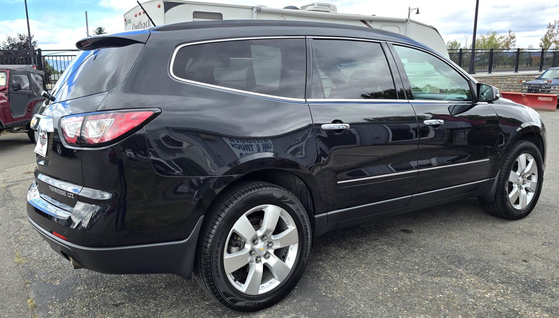 2014 Black /Black Chevrolet Traverse LTZ AWD (1GNKVJKD8EJ) with an 3.6L V6 DOHC 24V engine, 6-Speed Automatic transmission, located at 450 N Russell, Missoula, MT, 59801, (406) 543-6600, 46.874496, -114.017433 - Beautiful Loaded AWD Chevy. 3.6L V6 Engine. Automatic Transmission. Two Sun Roofs. Rear Entertainment. Heated and Cooled Front Seats. Middle Seats are Buckets with Arm Rests. 3rd Row Seating. Bluetooth Audio and Phone Connectivity. Excellent Tires. Front and Rear Climate Control. Bose Sound System. - Photo#6