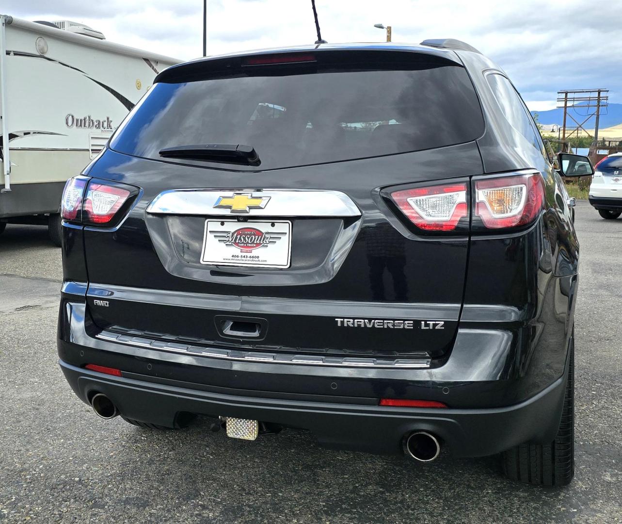 2014 Black /Black Chevrolet Traverse LTZ AWD (1GNKVJKD8EJ) with an 3.6L V6 DOHC 24V engine, 6-Speed Automatic transmission, located at 450 N Russell, Missoula, MT, 59801, (406) 543-6600, 46.874496, -114.017433 - Beautiful Loaded AWD Chevy. 3.6L V6 Engine. Automatic Transmission. Two Sun Roofs. Rear Entertainment. Heated and Cooled Front Seats. Middle Seats are Buckets with Arm Rests. 3rd Row Seating. Bluetooth Audio and Phone Connectivity. Excellent Tires. Front and Rear Climate Control. Bose Sound System. - Photo#7