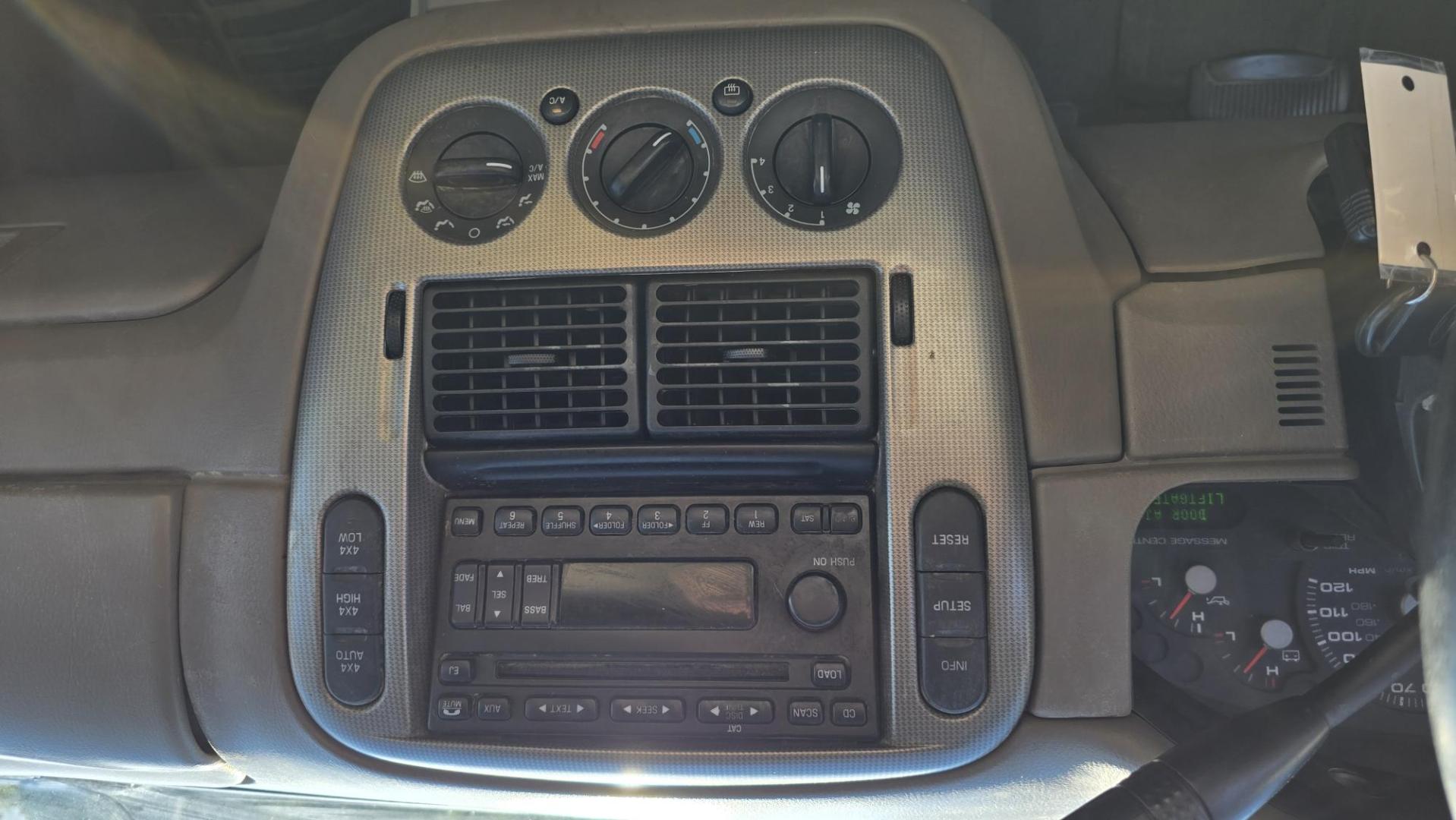 2005 Grey /Gray Ford Explorer XLT 4.0L 4WD (1FMZU73K95U) with an 4.0L V6 SOHC 12V FFV engine, 5-Speed Automatic Overdrive transmission, located at 450 N Russell, Missoula, MT, 59801, (406) 543-6600, 46.874496, -114.017433 - Good running 4WD SUV. 4.0 V6 Engine. Automatic Transmission. 3rd Row seating. Air Cruise Tilt. Power Windows and Locks. All works. Airbag was deployed at one point so there is an airbag light on. 4WD works well. Seems solid. New tires. I know its a little rough but it's well worth the price for a ru - Photo#12