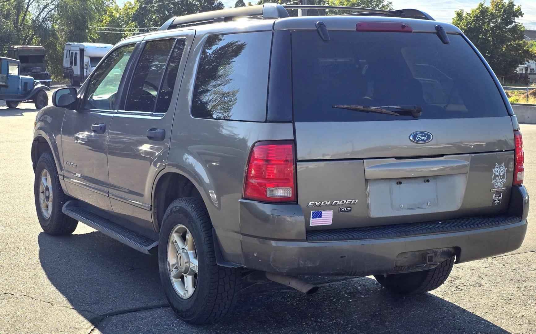 2005 Grey /Gray Ford Explorer XLT 4.0L 4WD (1FMZU73K95U) with an 4.0L V6 SOHC 12V FFV engine, 5-Speed Automatic Overdrive transmission, located at 450 N Russell, Missoula, MT, 59801, (406) 543-6600, 46.874496, -114.017433 - Good running 4WD SUV. 4.0 V6 Engine. Automatic Transmission. 3rd Row seating. Air Cruise Tilt. Power Windows and Locks. All works. Airbag was deployed at one point so there is an airbag light on. 4WD works well. Seems solid. New tires. I know its a little rough but it's well worth the price for a ru - Photo#6