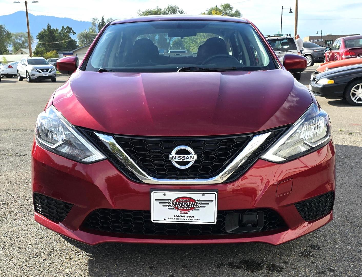 2019 Red /Black Nissan Sentra SV Special Edition (3N1AB7APXKY) with an 1.8L L4 SFI DOHC 16V engine, CVT transmission, located at 450 N Russell, Missoula, MT, 59801, (406) 543-6600, 46.874496, -114.017433 - Really Clean One Owner Sedan. Clean Carfax. 1.8L I4 Engine. FWD Automatic Transmission. Air. Cruise. Tilt. Power Sunroof. AM FM XM Bluetooth. Backup Camera. Special Edition features include: 17" Alloy Wheels. Wheels, Adaptive Cruise Control and Blindspot Monitor. - Photo#1