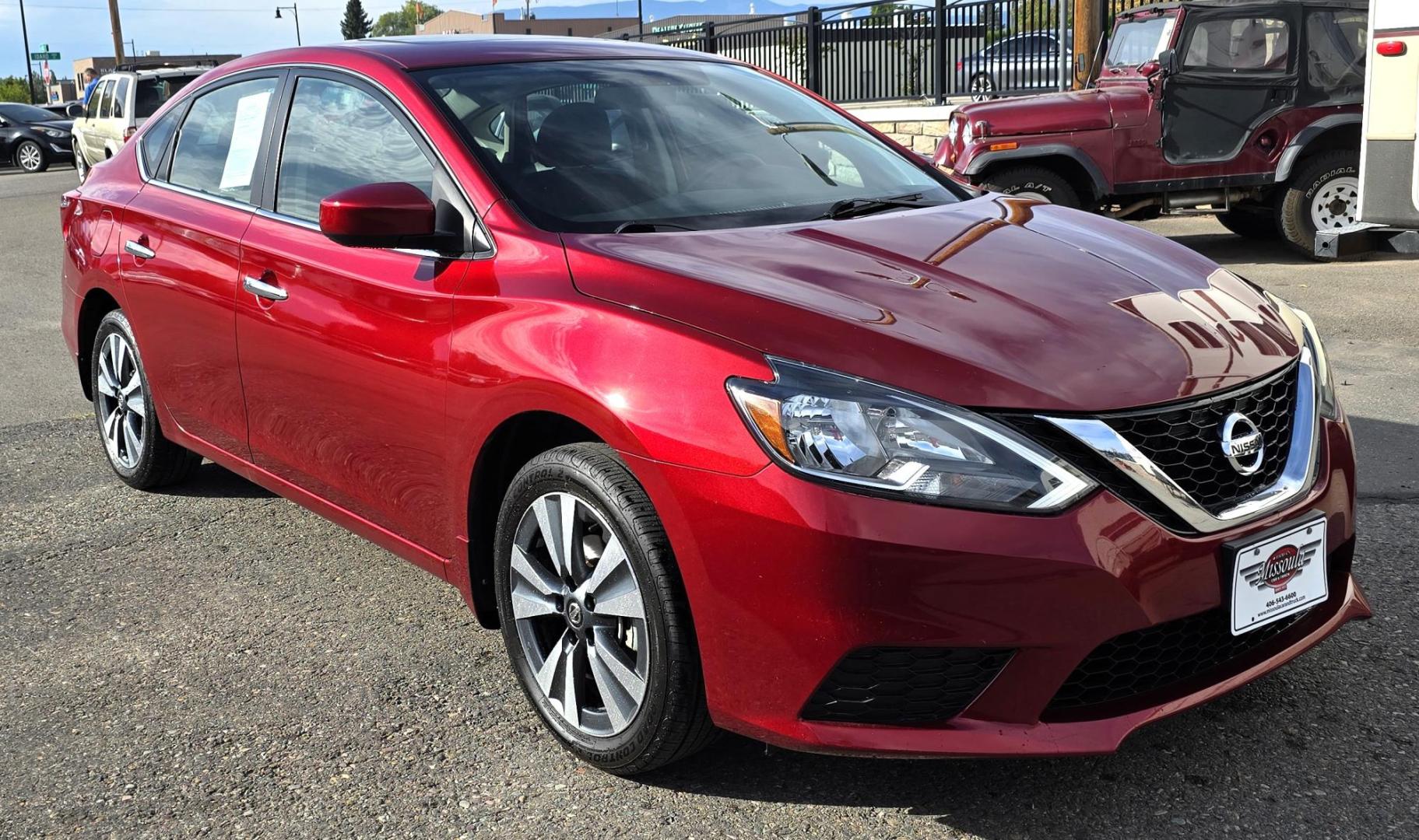 2019 Red /Black Nissan Sentra SV Special Edition (3N1AB7APXKY) with an 1.8L L4 SFI DOHC 16V engine, CVT transmission, located at 450 N Russell, Missoula, MT, 59801, (406) 543-6600, 46.874496, -114.017433 - Really Clean One Owner Sedan. Clean Carfax. 1.8L I4 Engine. FWD Automatic Transmission. Air. Cruise. Tilt. Power Sunroof. AM FM XM Bluetooth. Backup Camera. Special Edition features include: 17" Alloy Wheels. Wheels, Adaptive Cruise Control and Blindspot Monitor. - Photo#4