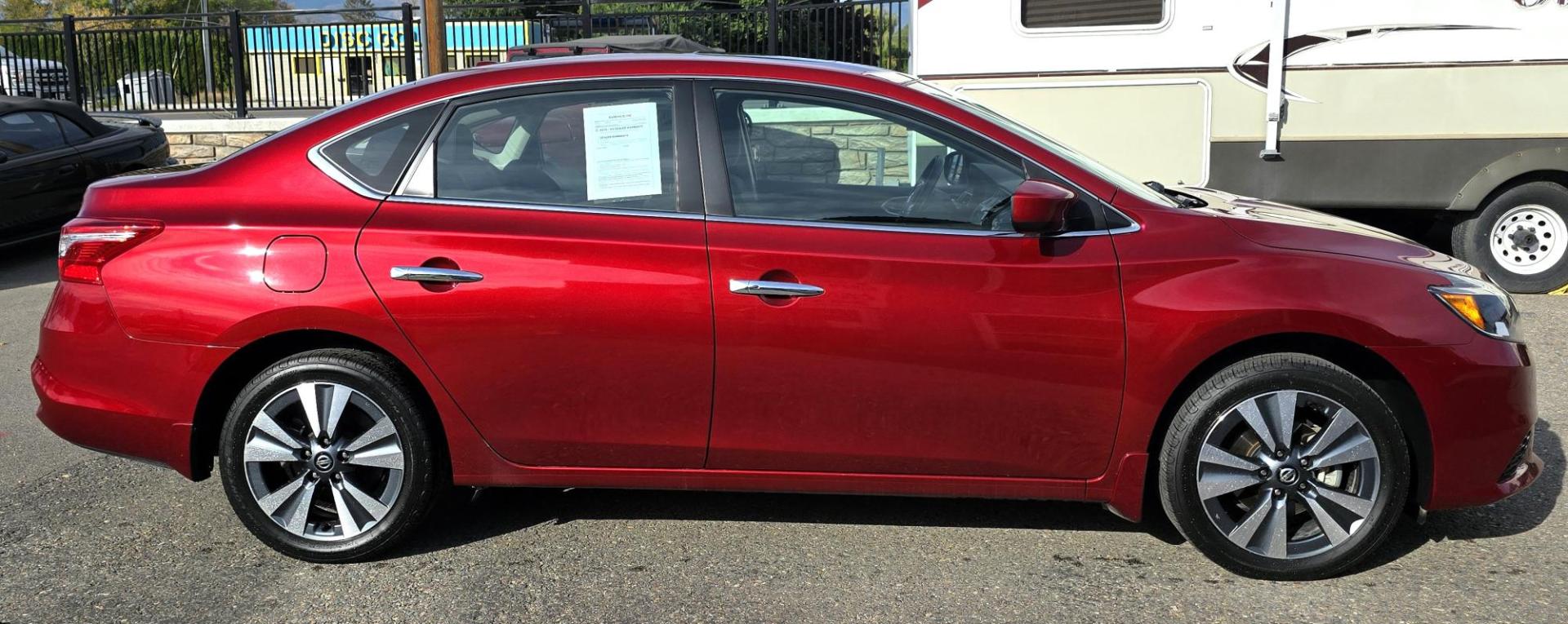 2019 Red /Black Nissan Sentra SV Special Edition (3N1AB7APXKY) with an 1.8L L4 SFI DOHC 16V engine, CVT transmission, located at 450 N Russell, Missoula, MT, 59801, (406) 543-6600, 46.874496, -114.017433 - Really Clean One Owner Sedan. Clean Carfax. 1.8L I4 Engine. FWD Automatic Transmission. Air. Cruise. Tilt. Power Sunroof. AM FM XM Bluetooth. Backup Camera. Special Edition features include: 17" Alloy Wheels. Wheels, Adaptive Cruise Control and Blindspot Monitor. - Photo#5