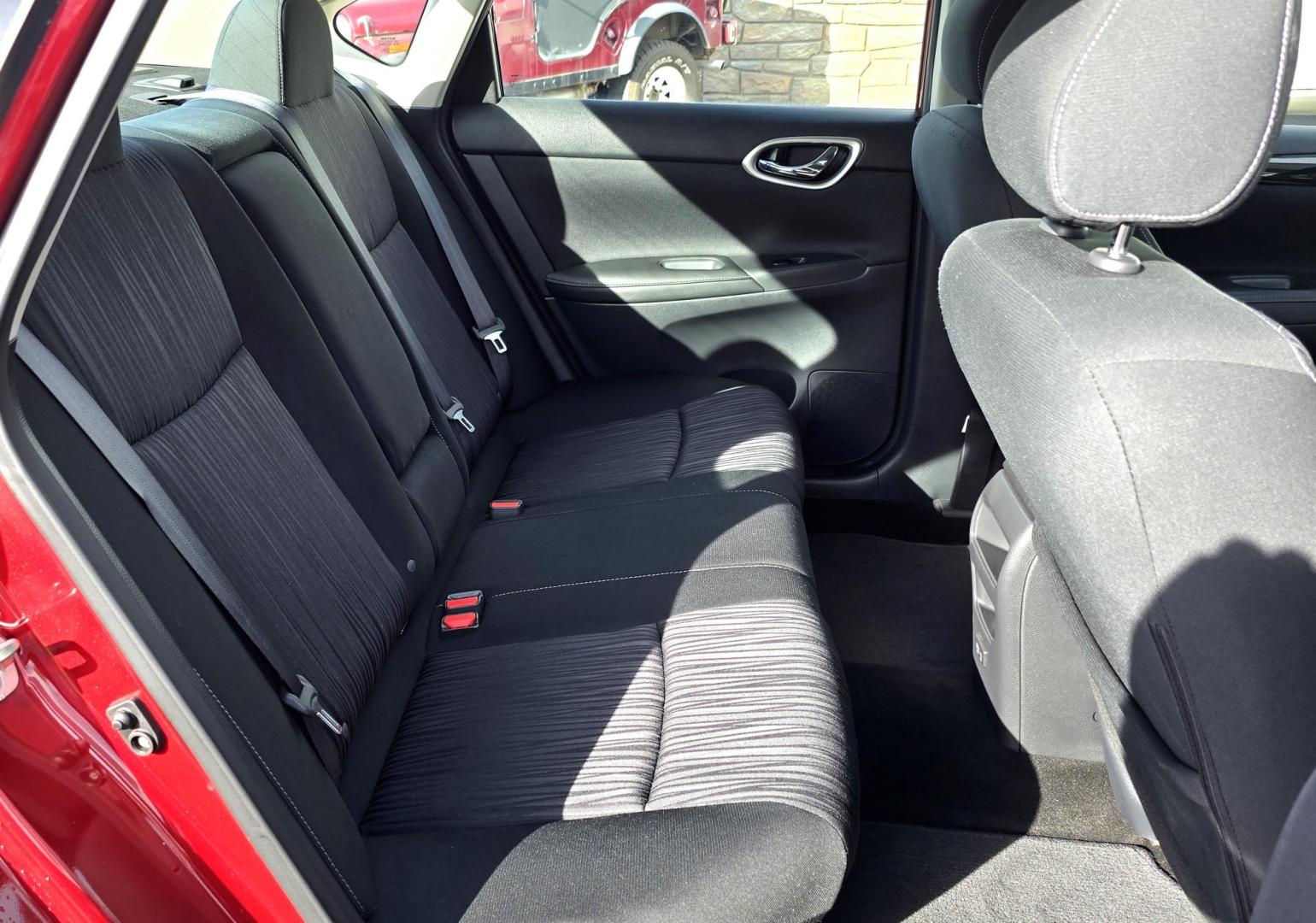 2019 Red /Black Nissan Sentra SV Special Edition (3N1AB7APXKY) with an 1.8L L4 SFI DOHC 16V engine, CVT transmission, located at 450 N Russell, Missoula, MT, 59801, (406) 543-6600, 46.874496, -114.017433 - Really Clean One Owner Sedan. Clean Carfax. 1.8L I4 Engine. FWD Automatic Transmission. Air. Cruise. Tilt. Power Sunroof. AM FM XM Bluetooth. Backup Camera. Special Edition features include: 17" Alloy Wheels. Wheels, Adaptive Cruise Control and Blindspot Monitor. - Photo#9