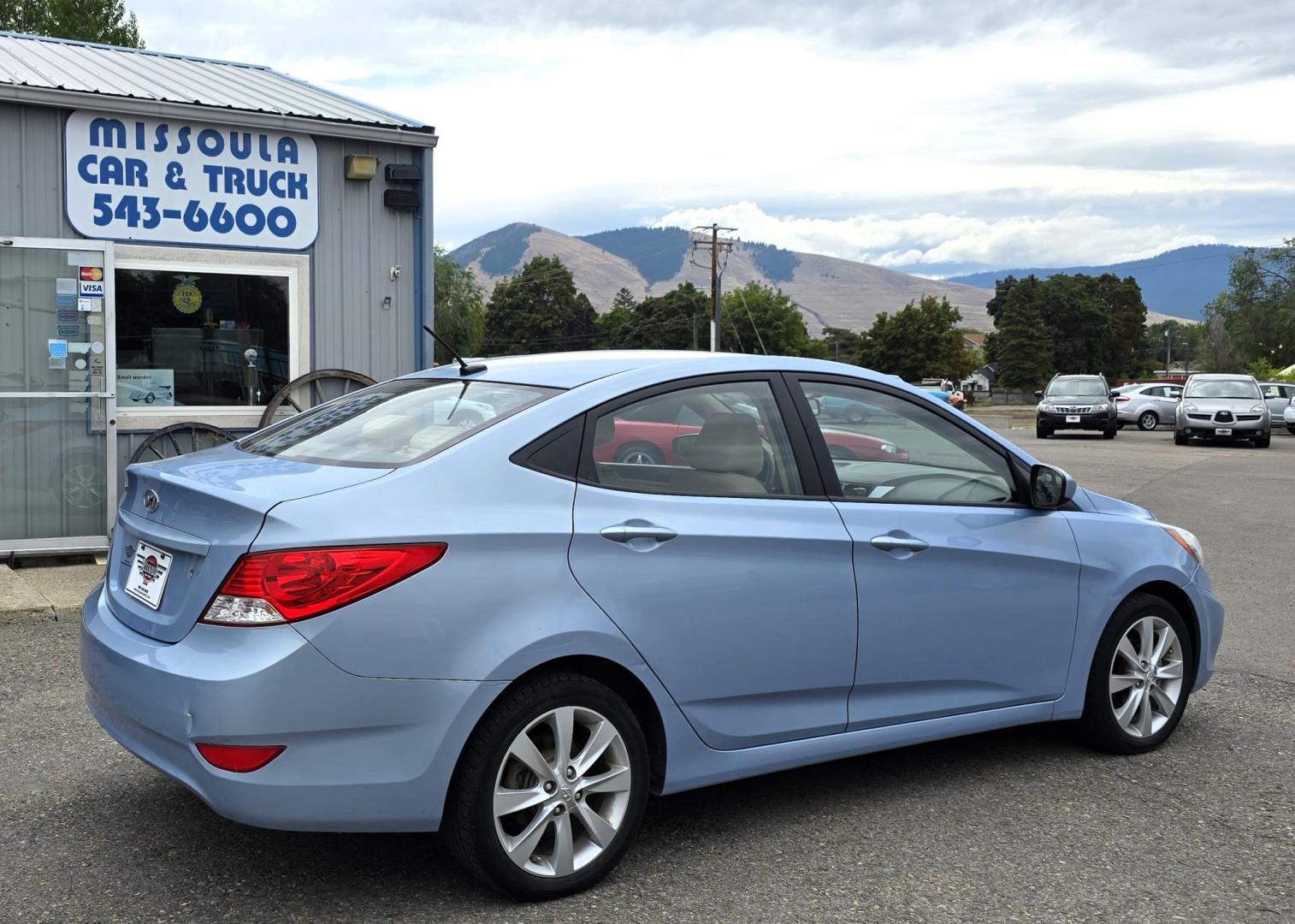 2012 Blue /Tan Hyundai Accent GLS 4-Door (KMHCU4AEXCU) with an 1.6L L4 DOHC 16V engine, Automatic transmission, located at 450 N Russell, Missoula, MT, 59801, (406) 543-6600, 46.874496, -114.017433 - Nice little Economy . 1.6L I4 Engine. Automatic Transmission. FWD. Cruise. Tilt. Power Windows and Locks. AM FM XM CD Stereo. Bluetooth. Air Conditioning does not work. - Photo#0