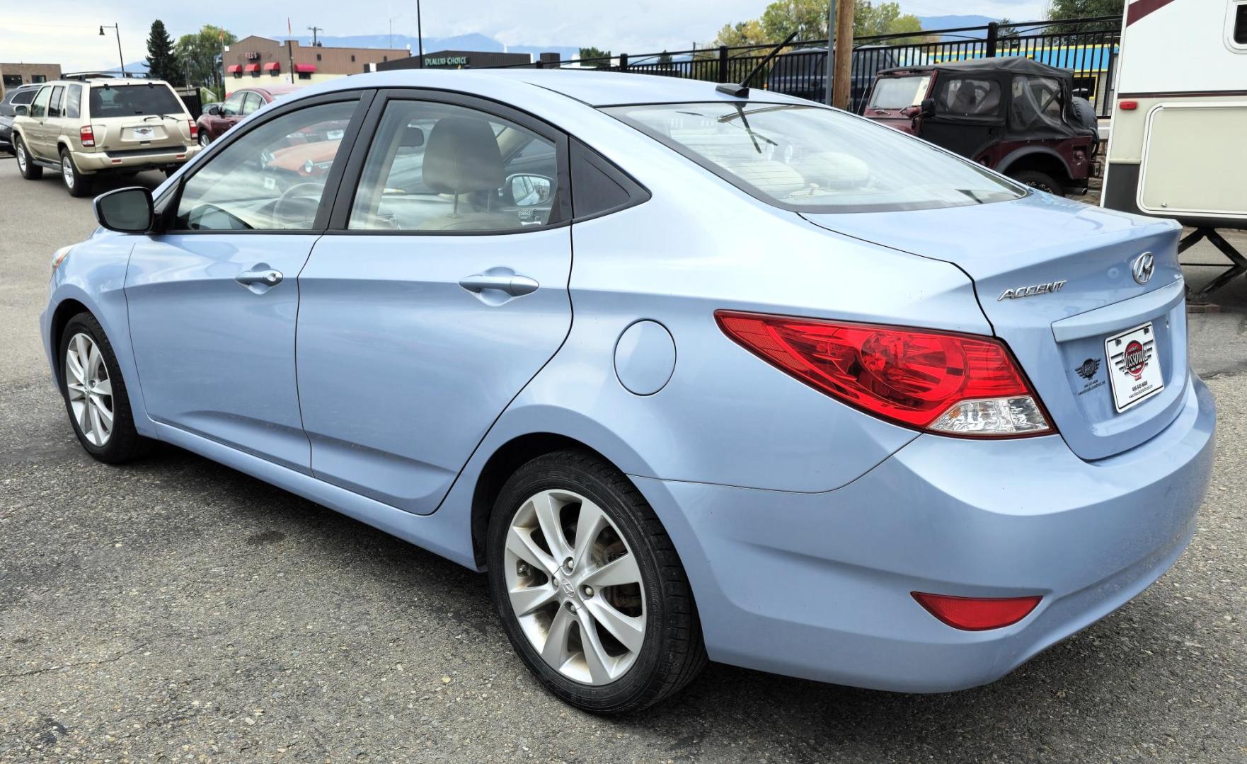 2012 Blue /Tan Hyundai Accent GLS 4-Door (KMHCU4AEXCU) with an 1.6L L4 DOHC 16V engine, Automatic transmission, located at 450 N Russell, Missoula, MT, 59801, (406) 543-6600, 46.874496, -114.017433 - Nice little Economy . 1.6L I4 Engine. Automatic Transmission. FWD. Cruise. Tilt. Power Windows and Locks. AM FM XM CD Stereo. Bluetooth. Air Conditioning does not work. - Photo#14