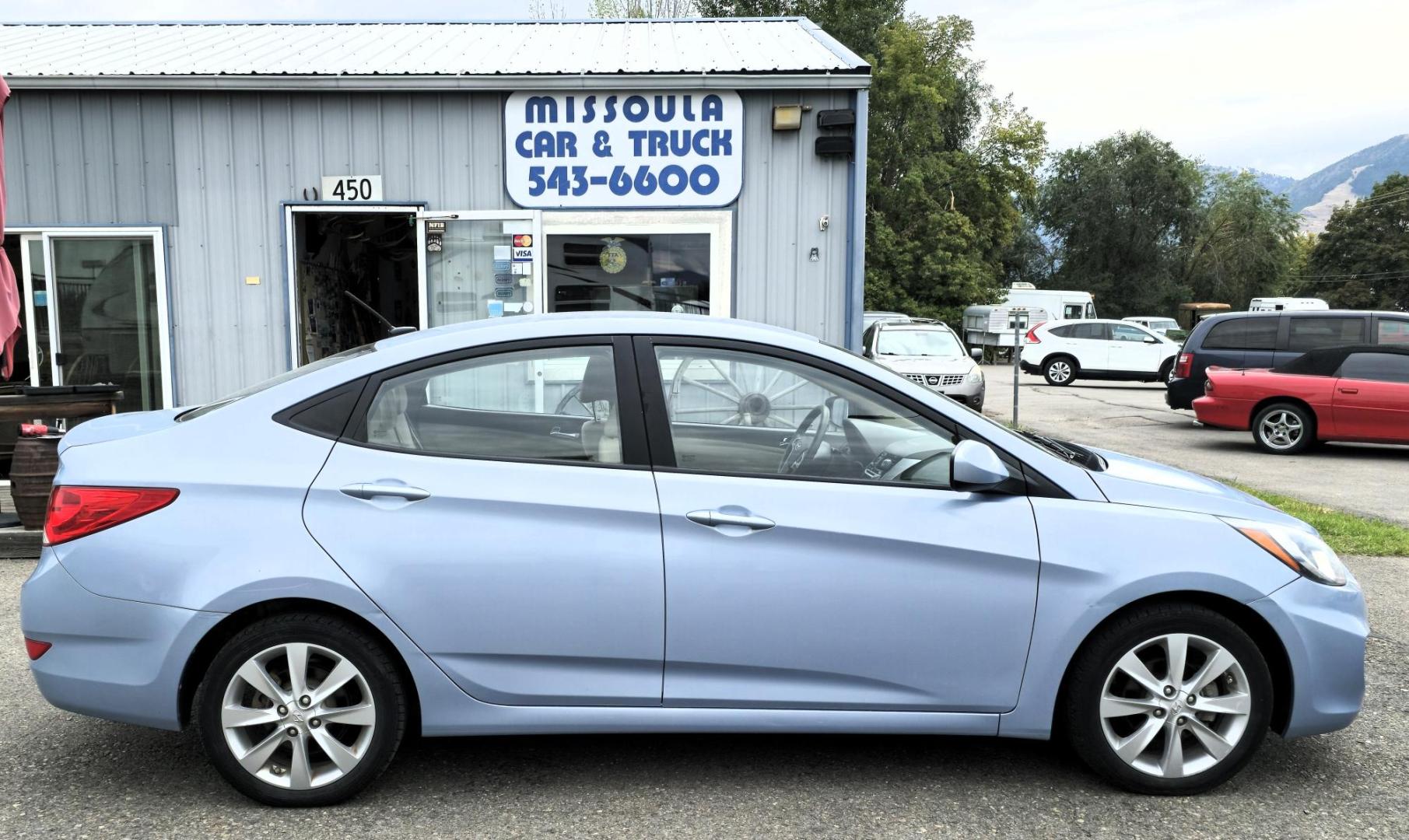 2012 Blue /Tan Hyundai Accent GLS 4-Door (KMHCU4AEXCU) with an 1.6L L4 DOHC 16V engine, Automatic transmission, located at 450 N Russell, Missoula, MT, 59801, (406) 543-6600, 46.874496, -114.017433 - Photo#2