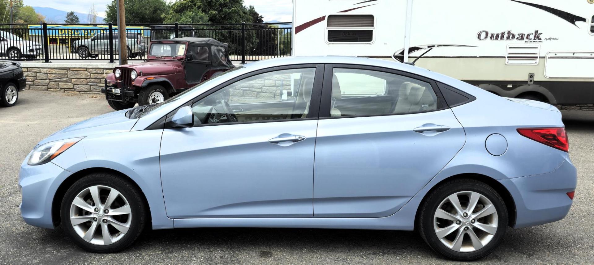 2012 Blue /Tan Hyundai Accent GLS 4-Door (KMHCU4AEXCU) with an 1.6L L4 DOHC 16V engine, Automatic transmission, located at 450 N Russell, Missoula, MT, 59801, (406) 543-6600, 46.874496, -114.017433 - Nice little Economy . 1.6L I4 Engine. Automatic Transmission. FWD. Cruise. Tilt. Power Windows and Locks. AM FM XM CD Stereo. Bluetooth. Air Conditioning does not work. - Photo#6