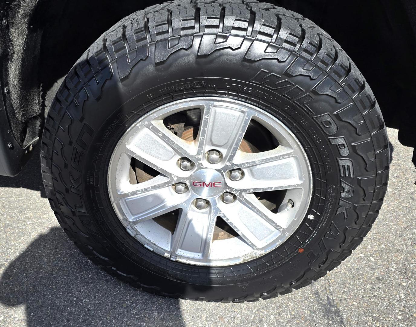 2014 Bronze /Black GMC Sierra 1500 SLE Crew Cab 4WD (3GTU2UEC9EG) with an 5.3L V8 OHV 16V engine, 6-Speed Automatic transmission, located at 450 N Russell, Missoula, MT, 59801, (406) 543-6600, 46.874496, -114.017433 - 1/2 Ton 4WD GMC in Good Condition. Drivers Seats has a small tear. 5.3L V8. Automatic Transmission. Power Drivers Seat. Heated Seats. Navigation. AM FM XM Bluetooth. backup Camera. Tonneau Cover. Towing Package. Beefy Tires. Good fuel economy for it's size. - Photo#16