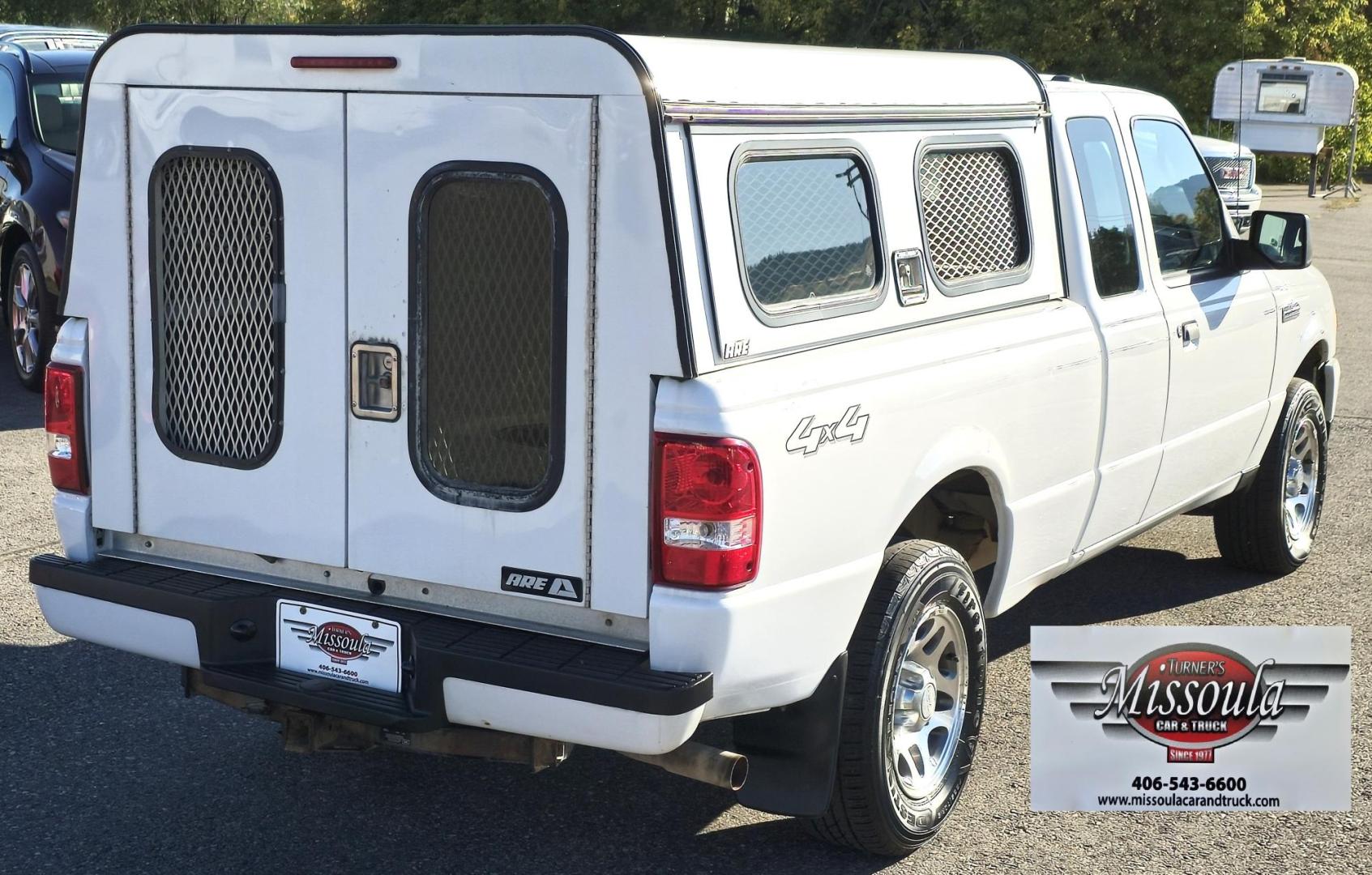 2011 White /Black Ford Ranger XLT SuperCab 4-Door 4WD (1FTLR4FE5BP) with an 4.0L V6 SOHC 12V engine, Automatic transmission, located at 450 N Russell, Missoula, MT, 59801, (406) 543-6600, 46.874496, -114.017433 - Former Animal Control Truck with Topper. 4 Wheel Drive. 4.0L V6 Engine. Automatic Transmission. Air Cruise Tilt. Power Windows and Locks. Towing. Runs Well. Would make a great small 4WD for a Bird Hunter with his dog. - Photo#3