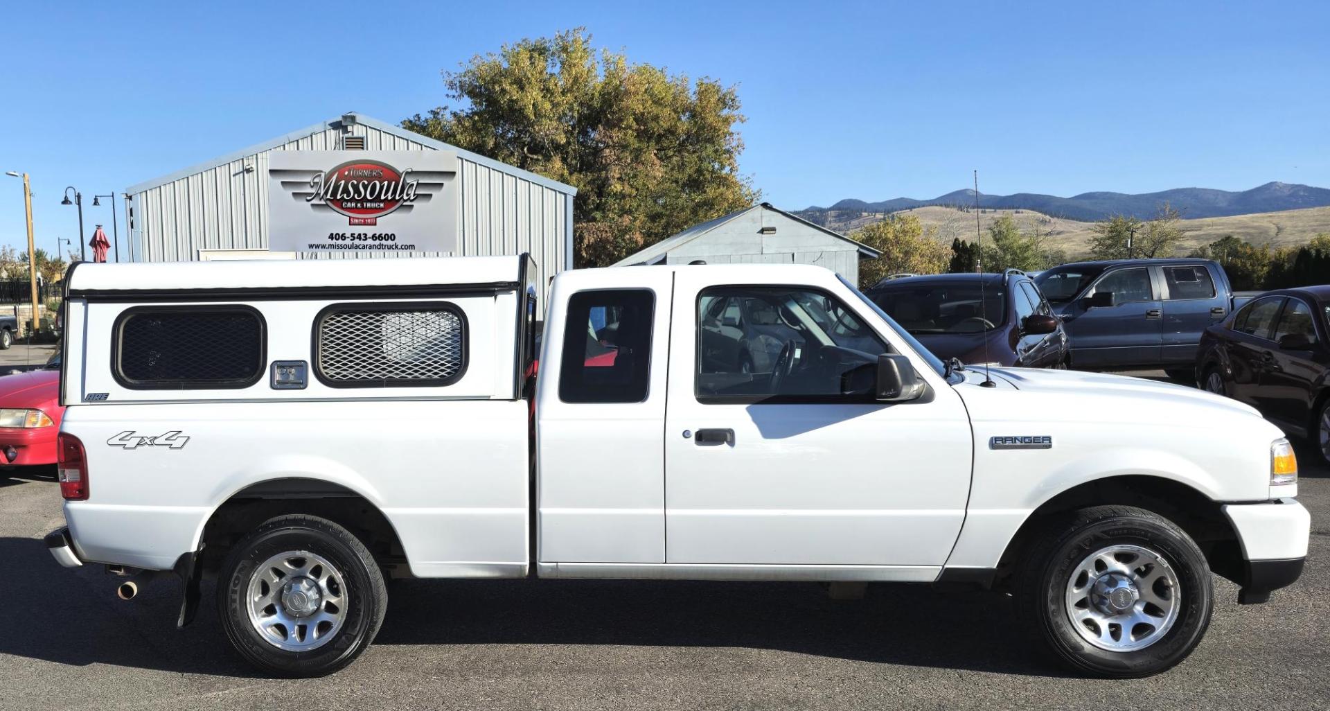 2011 White /Black Ford Ranger XLT SuperCab 4-Door 4WD (1FTLR4FE5BP) with an 4.0L V6 SOHC 12V engine, Automatic transmission, located at 450 N Russell, Missoula, MT, 59801, (406) 543-6600, 46.874496, -114.017433 - Photo#0