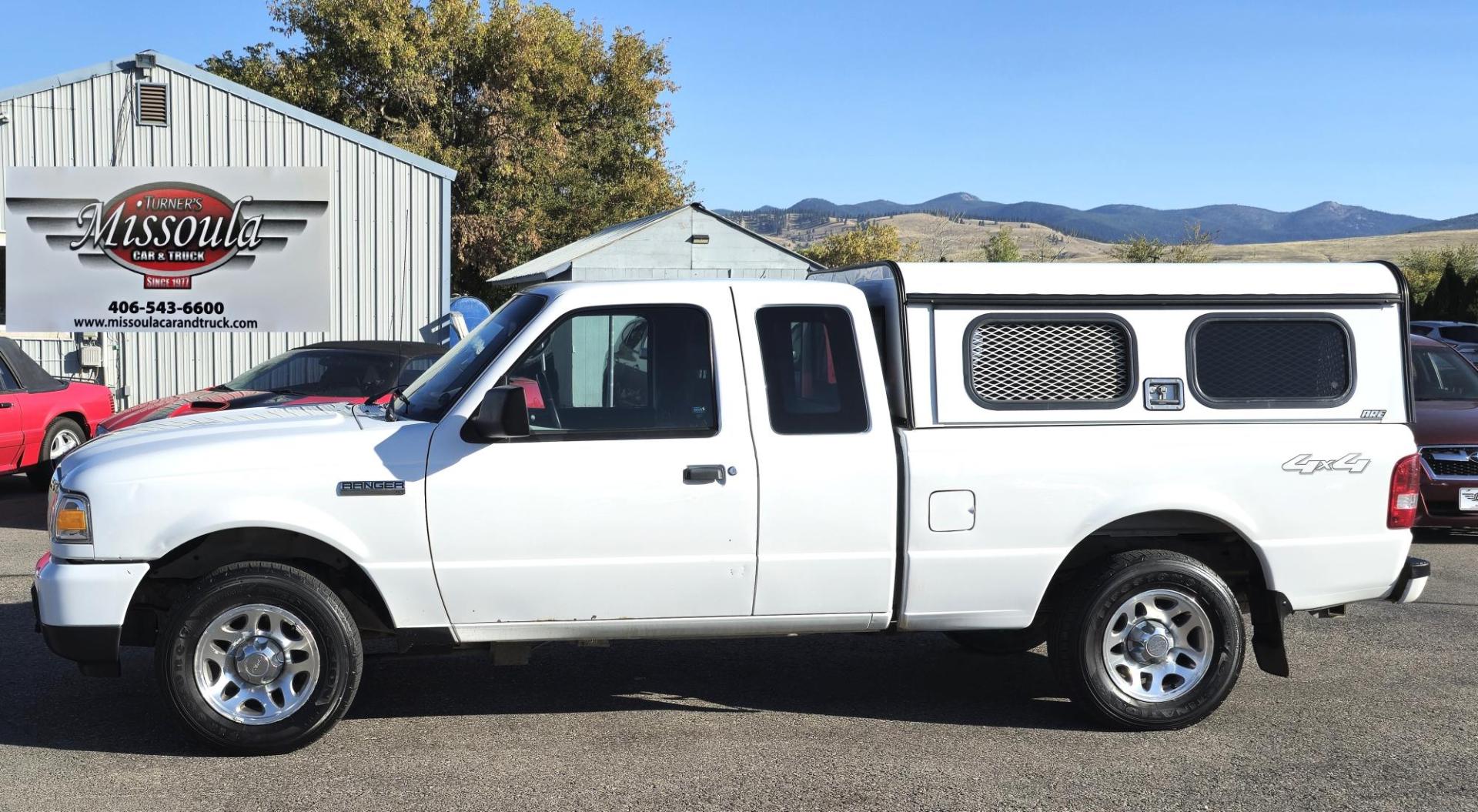 2011 White /Black Ford Ranger XLT SuperCab 4-Door 4WD (1FTLR4FE5BP) with an 4.0L V6 SOHC 12V engine, Automatic transmission, located at 450 N Russell, Missoula, MT, 59801, (406) 543-6600, 46.874496, -114.017433 - Former Animal Control Truck with Topper. 4 Wheel Drive. 4.0L V6 Engine. Automatic Transmission. Air Cruise Tilt. Power Windows and Locks. Towing. Runs Well. Would make a great small 4WD for a Bird Hunter with his dog. - Photo#2