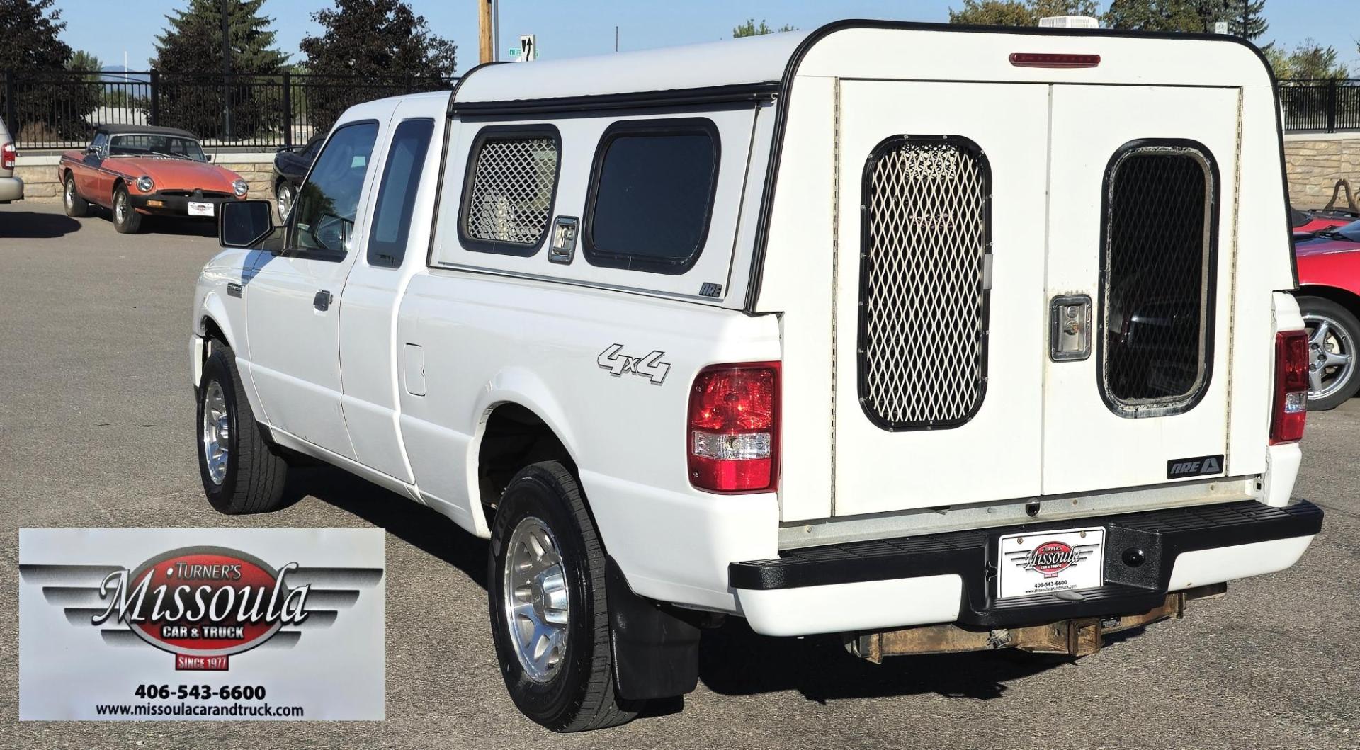 2011 White /Black Ford Ranger XLT SuperCab 4-Door 4WD (1FTLR4FE5BP) with an 4.0L V6 SOHC 12V engine, Automatic transmission, located at 450 N Russell, Missoula, MT, 59801, (406) 543-6600, 46.874496, -114.017433 - Former Animal Control Truck with Topper. 4 Wheel Drive. 4.0L V6 Engine. Automatic Transmission. Air Cruise Tilt. Power Windows and Locks. Towing. Runs Well. Would make a great small 4WD for a Bird Hunter with his dog. - Photo#4