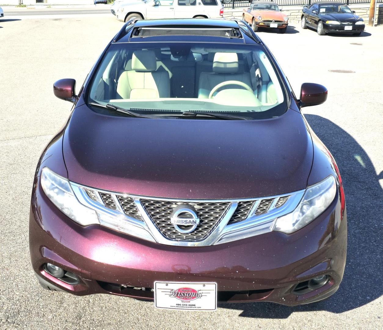 2014 Maroon /Tan Nissan Murano Premium LE AWD (JN8AZ1MWXEW) with an 3.5L V6 DOHC 24V engine, Continuously Variable Transmission transmission, located at 450 N Russell, Missoula, MT, 59801, (406) 543-6600, 46.874496, -114.017433 - Beautiful Maroon AWD Nissan. Only 84K Miles. 3.5L V6 Engine. Automatic Transmission. Power Sunroof. Power Heated Leather Seats. Heated Steering Wheel. Bluetooth Audio and Phone. Backup Camera. Navigation. - Photo#5