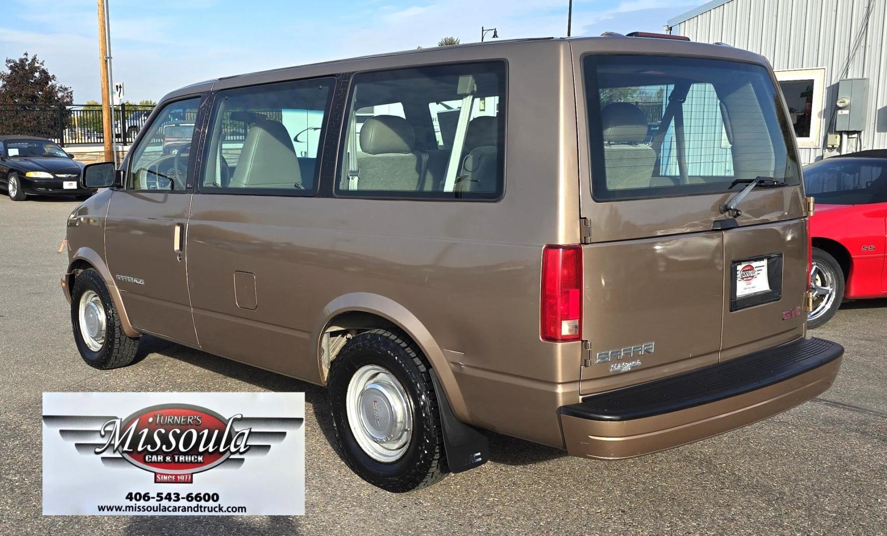 1999 Gold /Tan GMC Safari Passenger Van AWD (1GKEL19WXXB) with an 4.3L V6 OHV 12V engine, 4-Speed Automatic Overdrive transmission, located at 450 N Russell, Missoula, MT, 59801, (406) 543-6600, 46.874496, -114.017433 - Photo#2